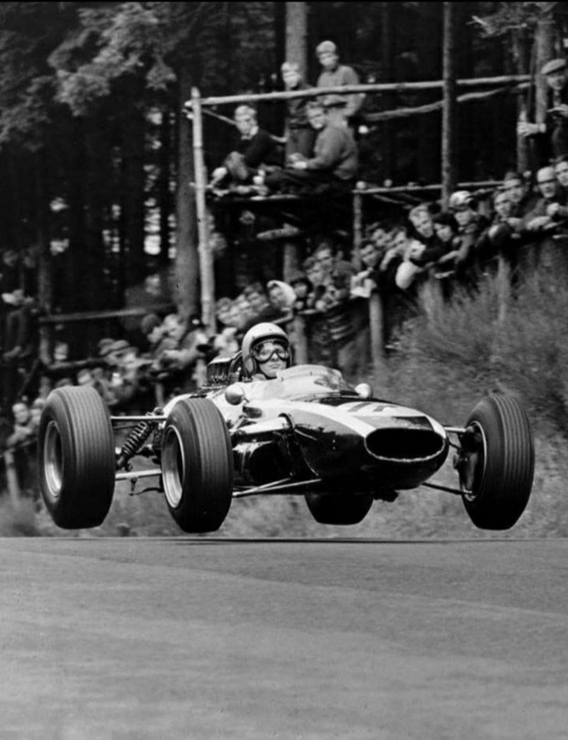 a close up of a black and brown abstract painting