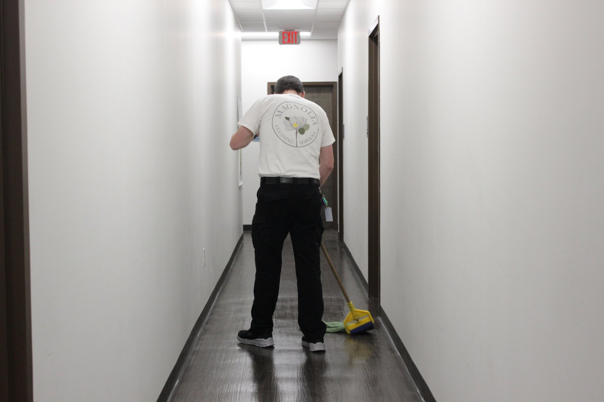 an abstract photo of a curved building with a blue sky in the background