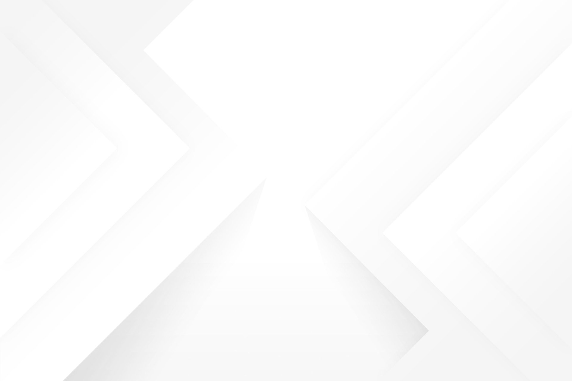 a laptop computer sitting on top of a wooden table