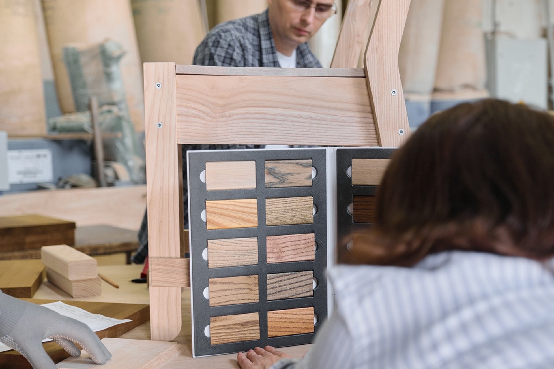 an abstract photo of a curved building with a blue sky in the background