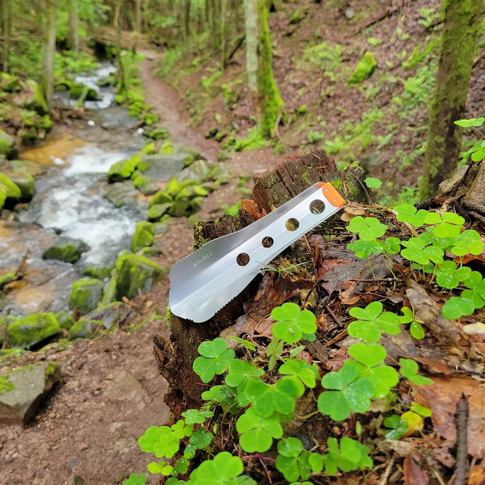 boglerco trowel lying against stump