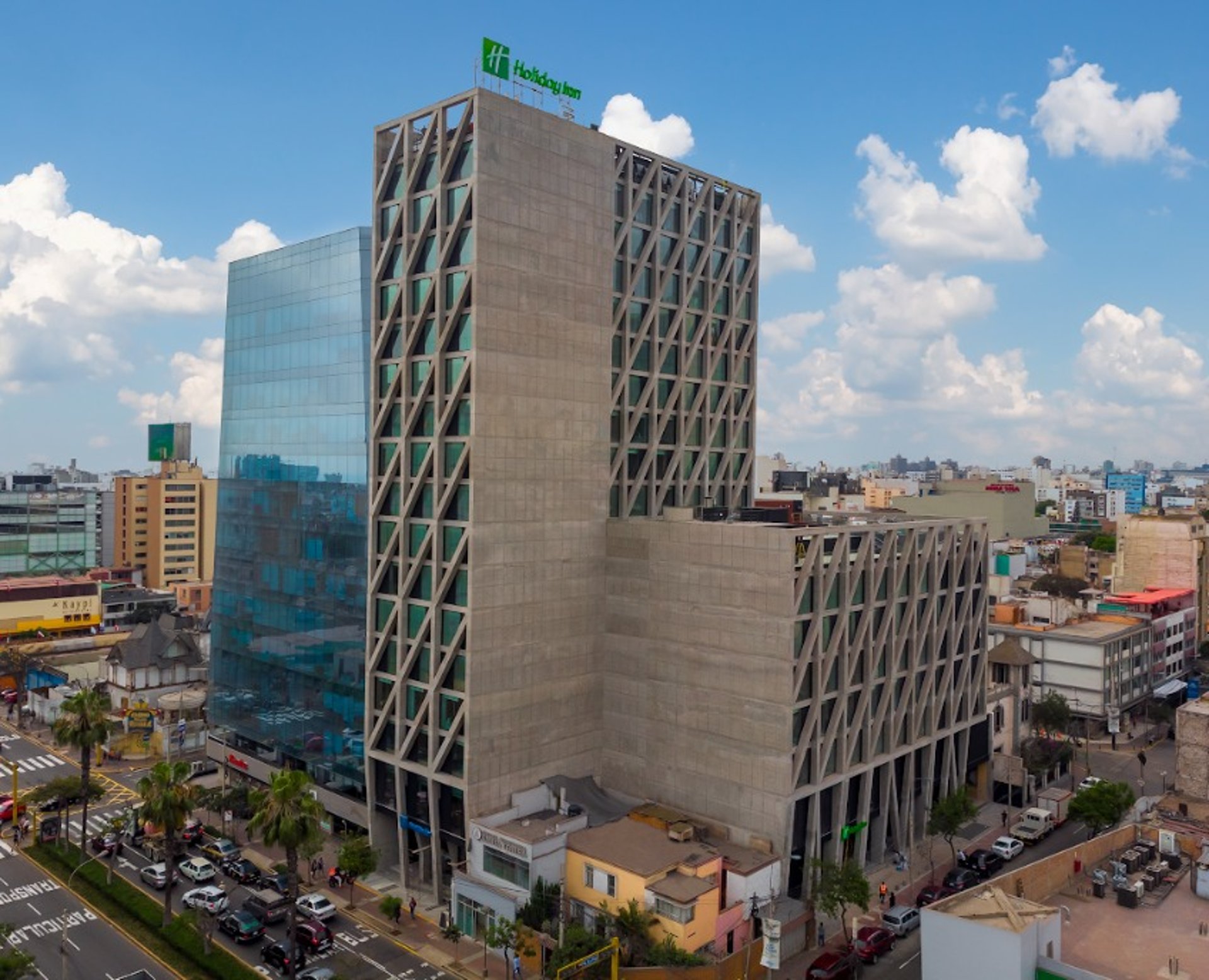 woman wearing yellow long-sleeved dress under white clouds and blue sky during daytime