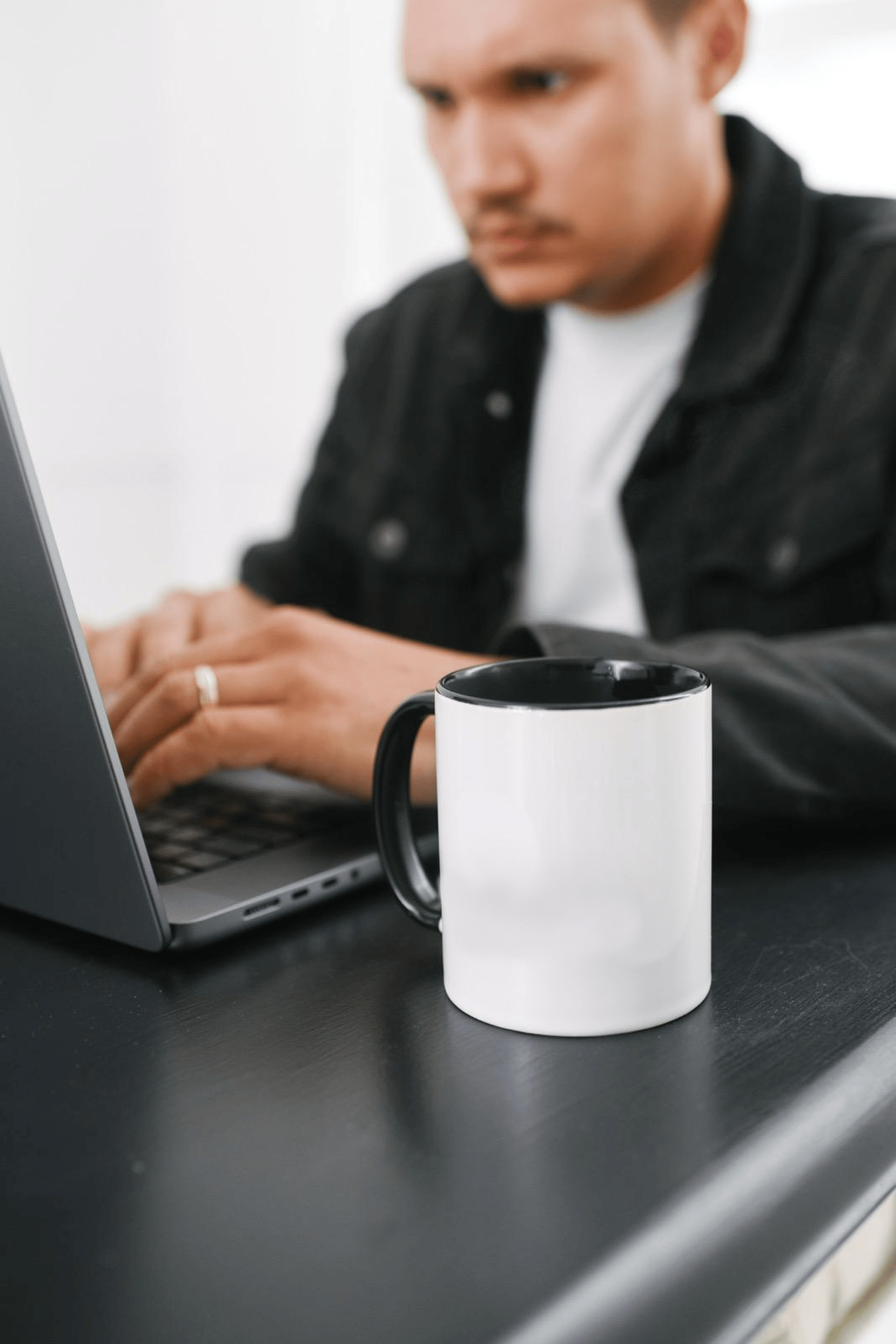 black and brown leather padded tub sofa