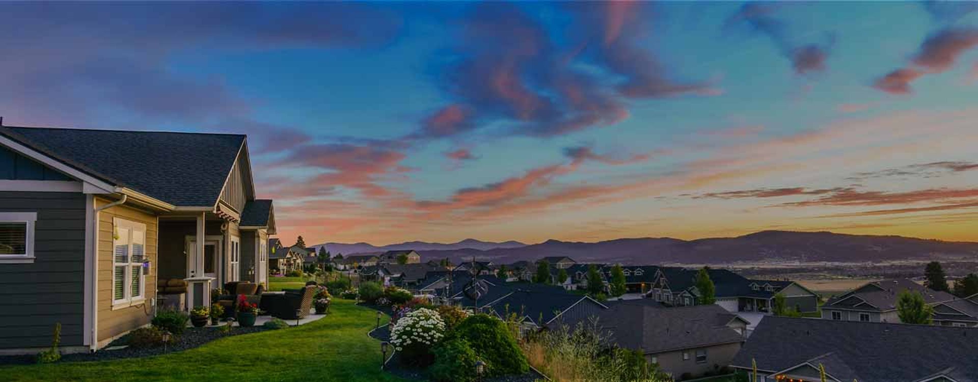 an abstract photo of a curved building with a blue sky in the background