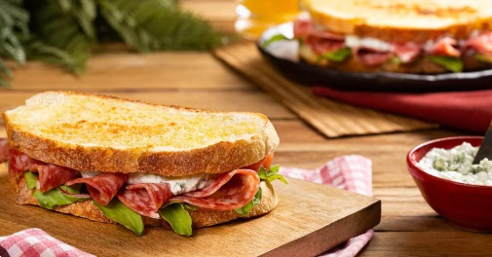 woman wearing yellow long-sleeved dress under white clouds and blue sky during daytime
