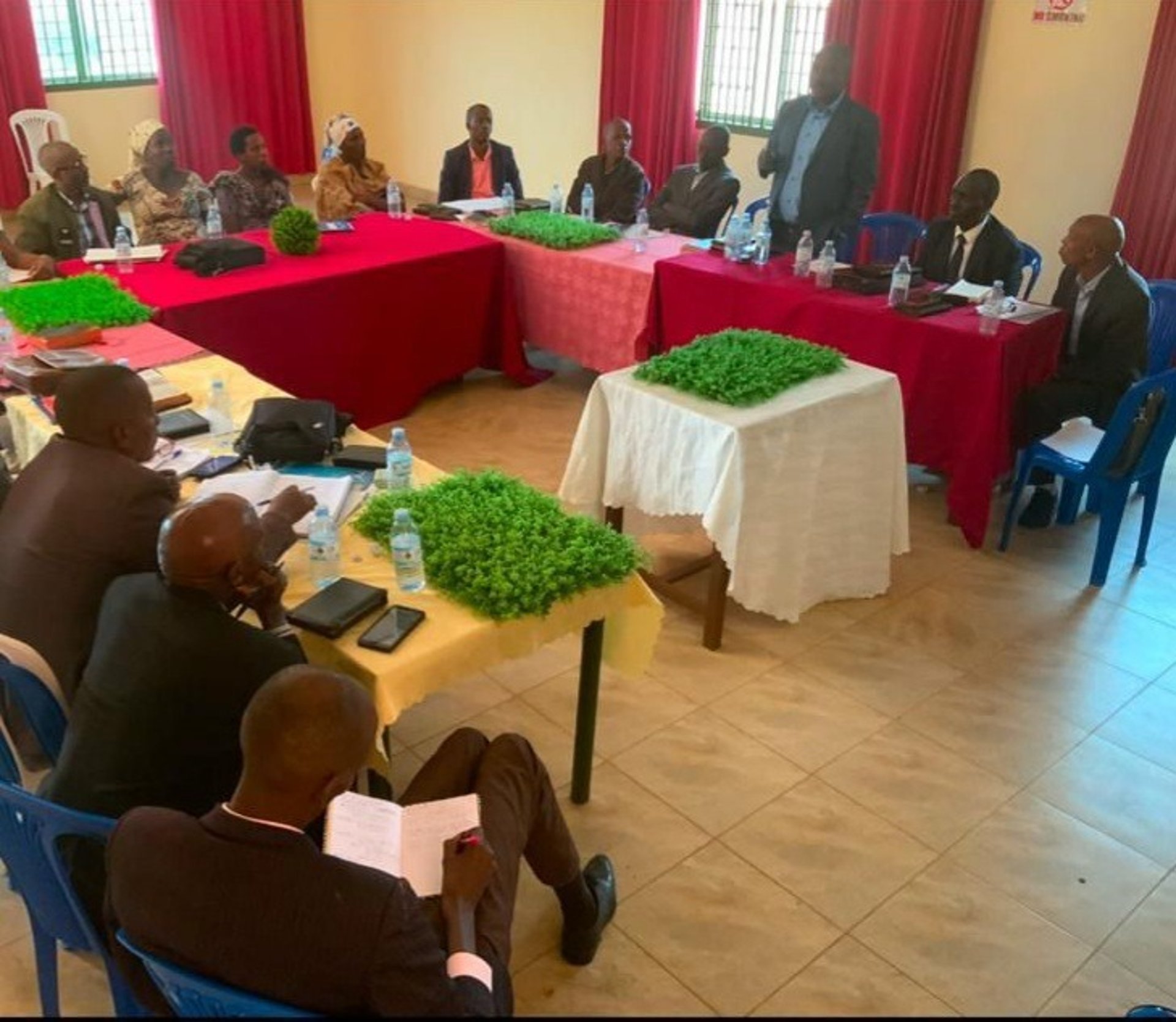 an abstract photo of a curved building with a blue sky in the background