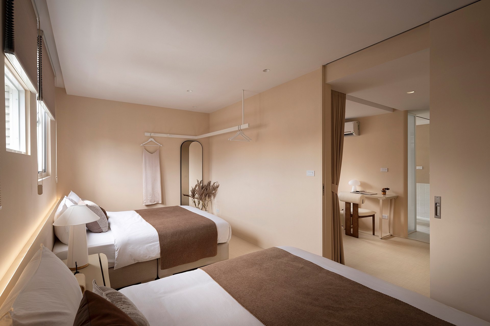 an abstract photo of a curved building with a blue sky in the background