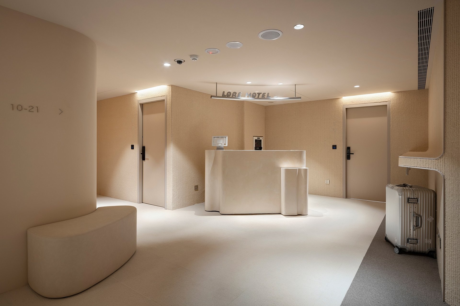 an abstract photo of a curved building with a blue sky in the background