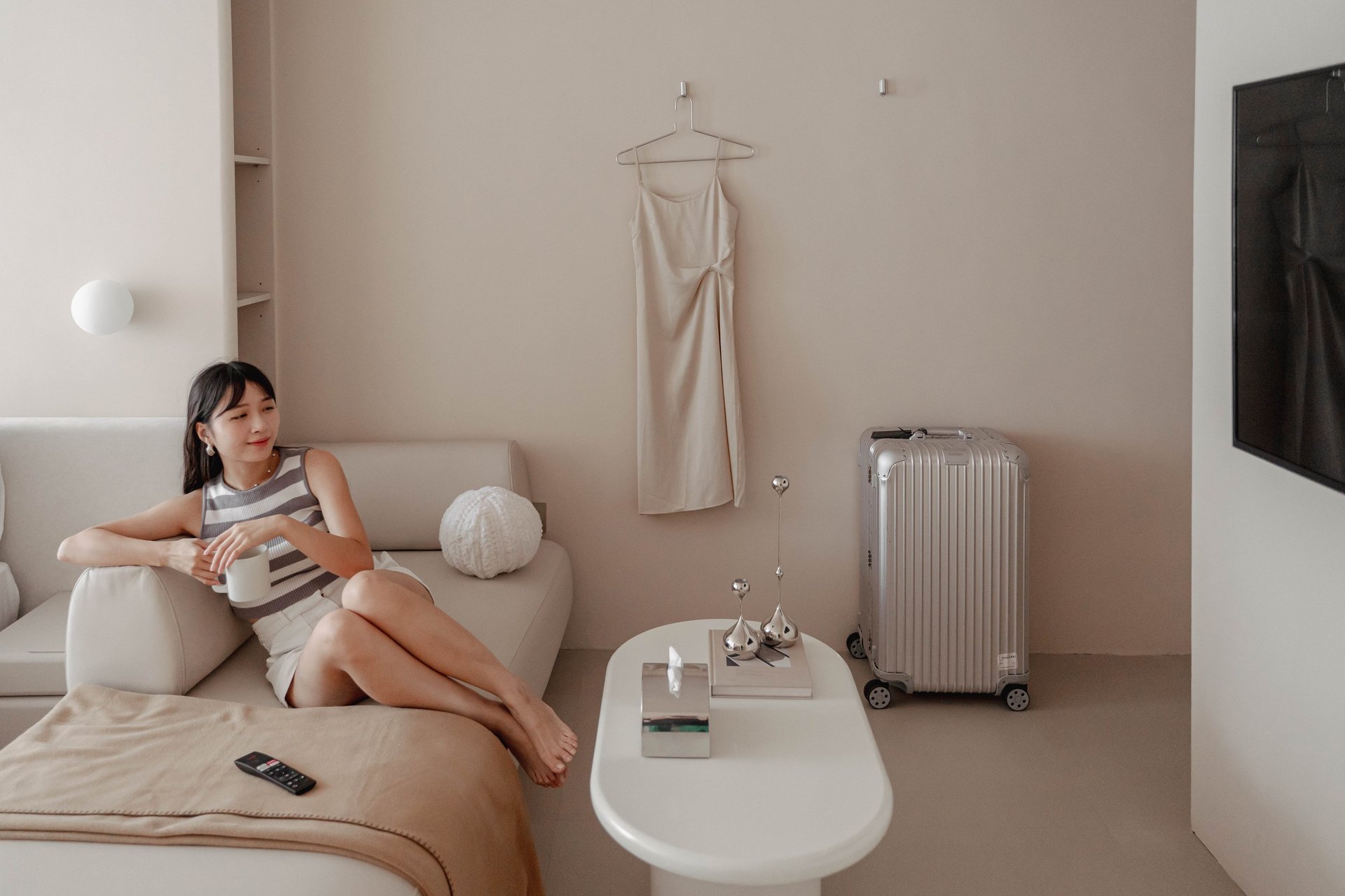 an abstract photo of a curved building with a blue sky in the background