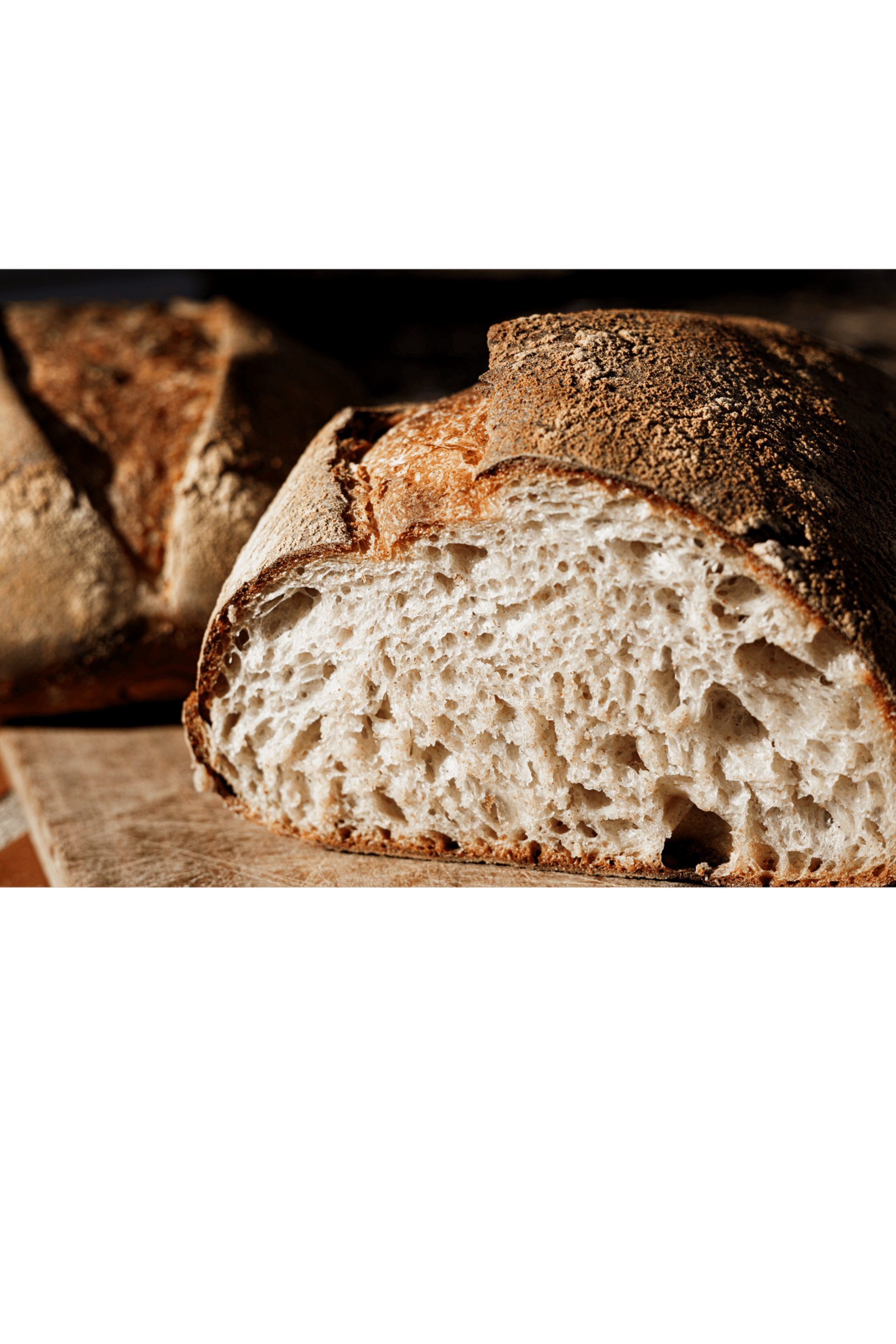 an abstract photo of a curved building with a blue sky in the background