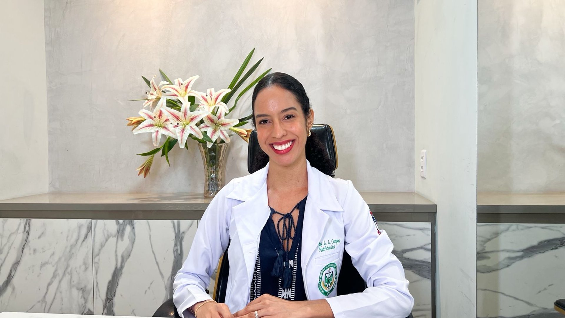woman in black long sleeve shirt sitting on chair