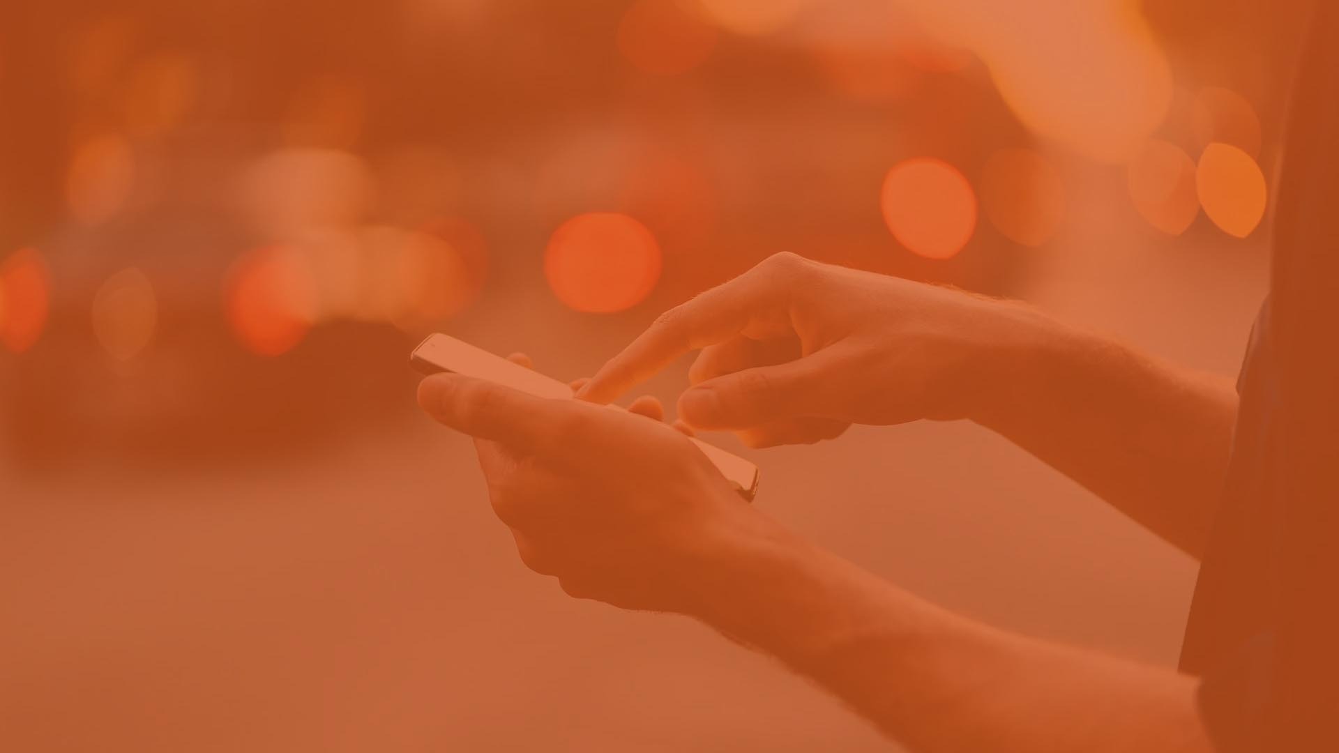 an abstract photo of a curved building with a blue sky in the background