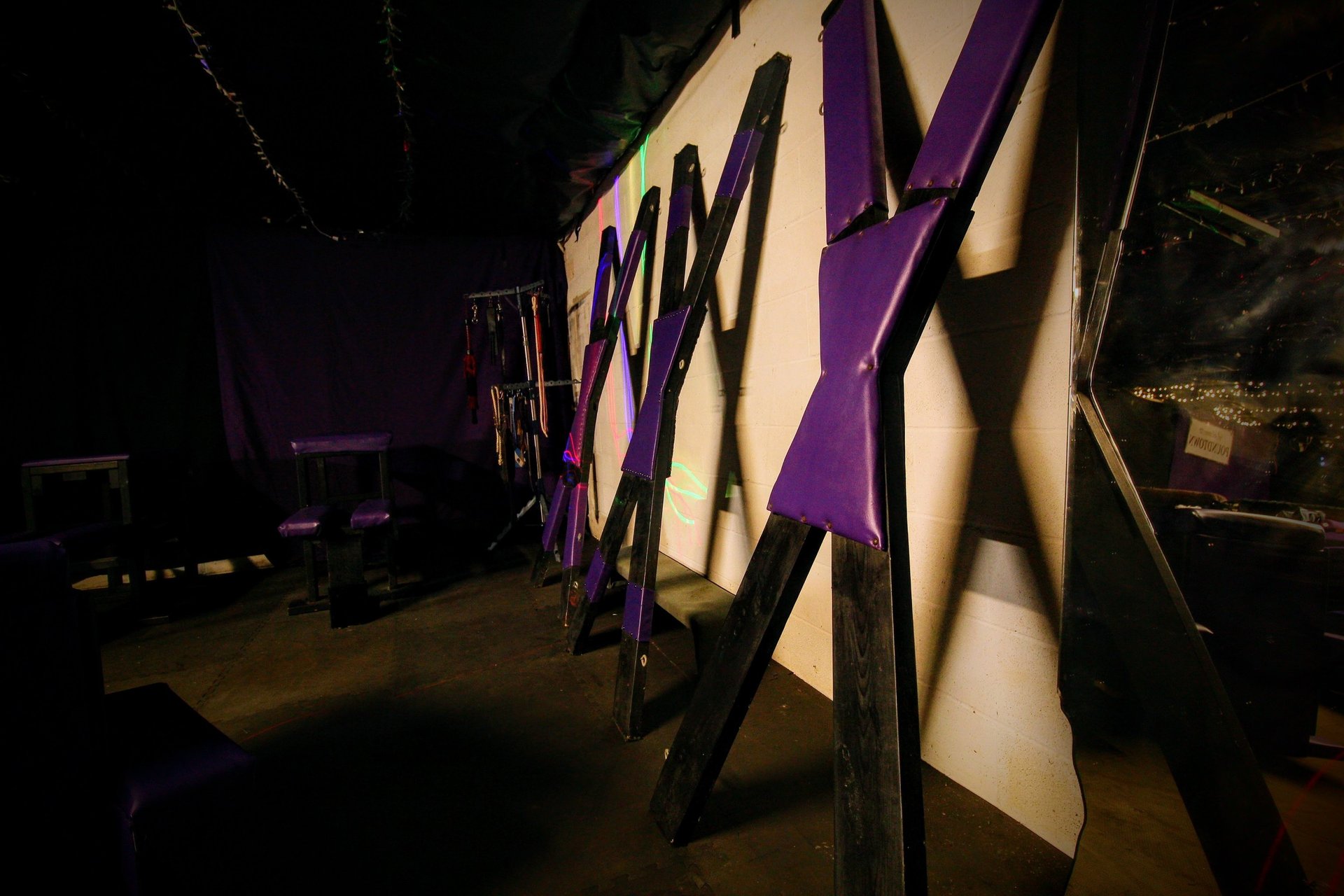 an abstract photo of a curved building with a blue sky in the background