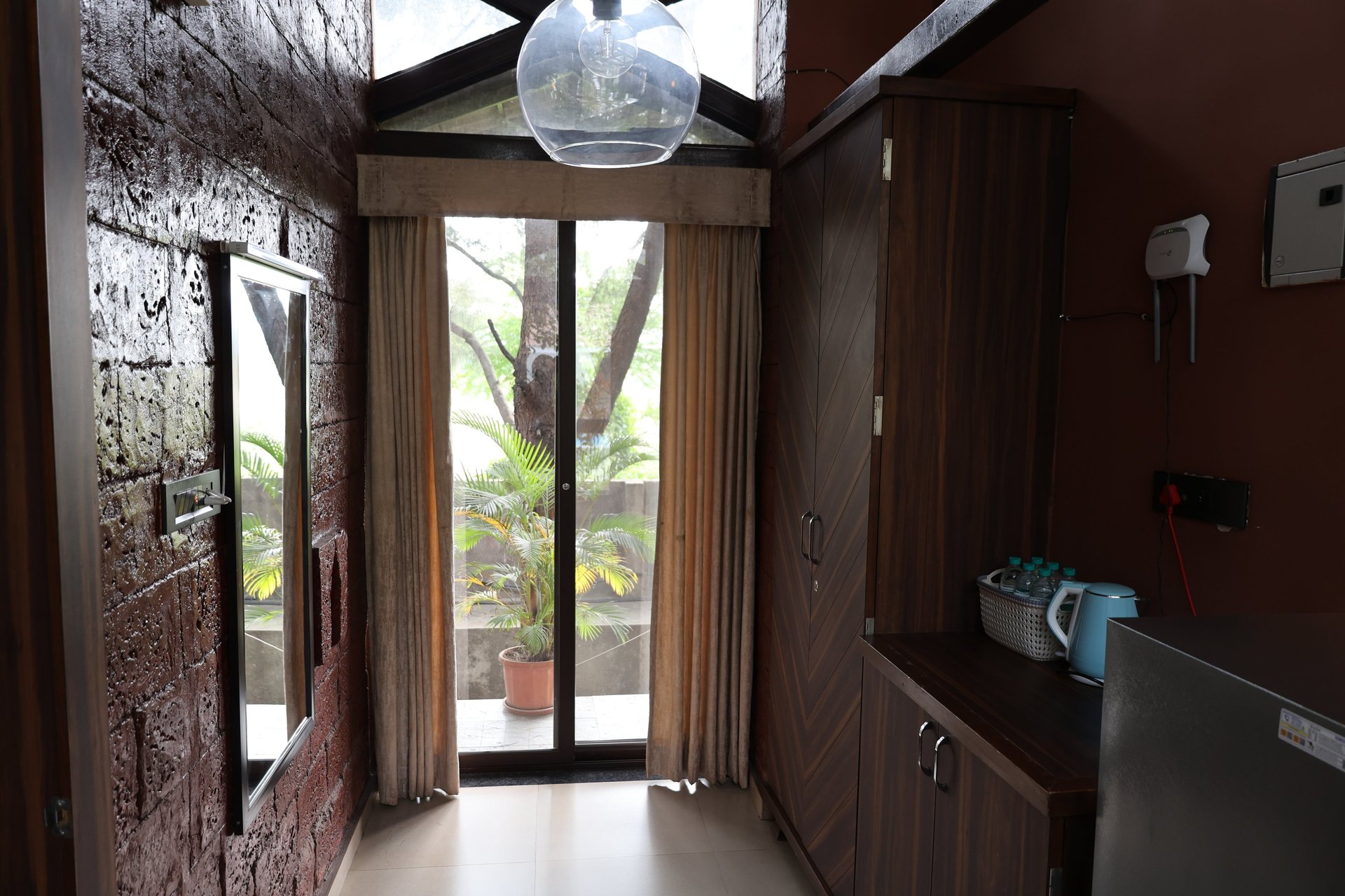 black and white bed near brown wooden table