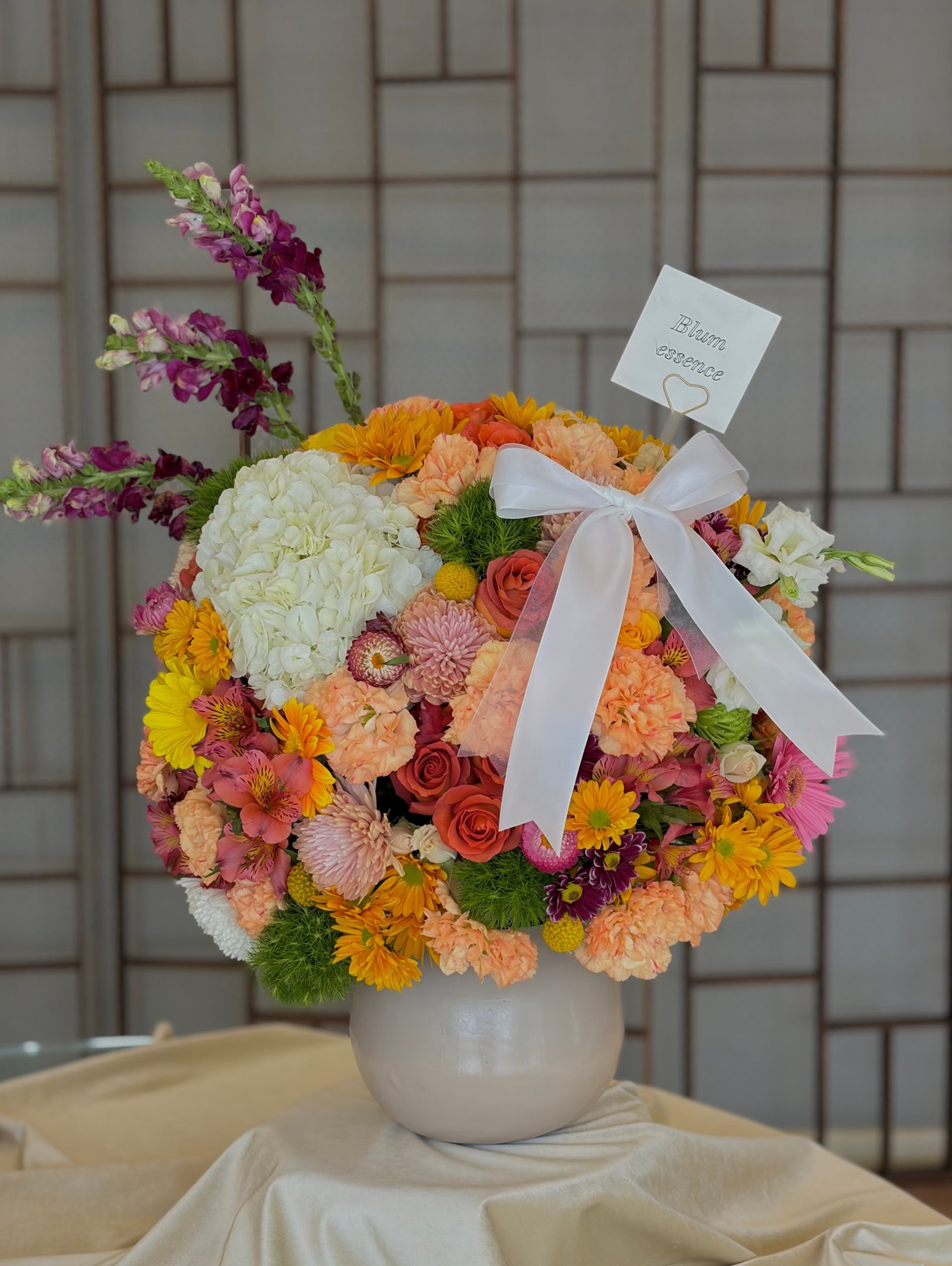 woman holding dried flower