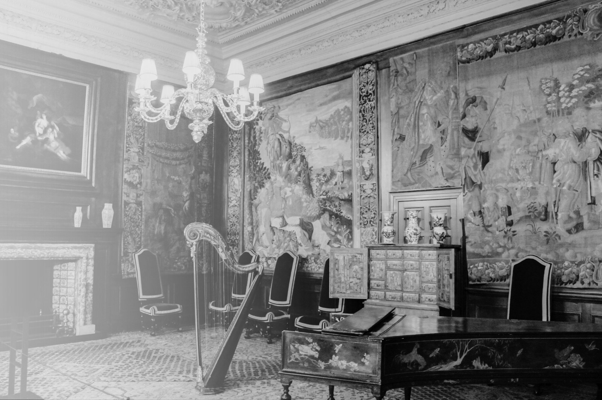 a hallway with a checkered floor and columns