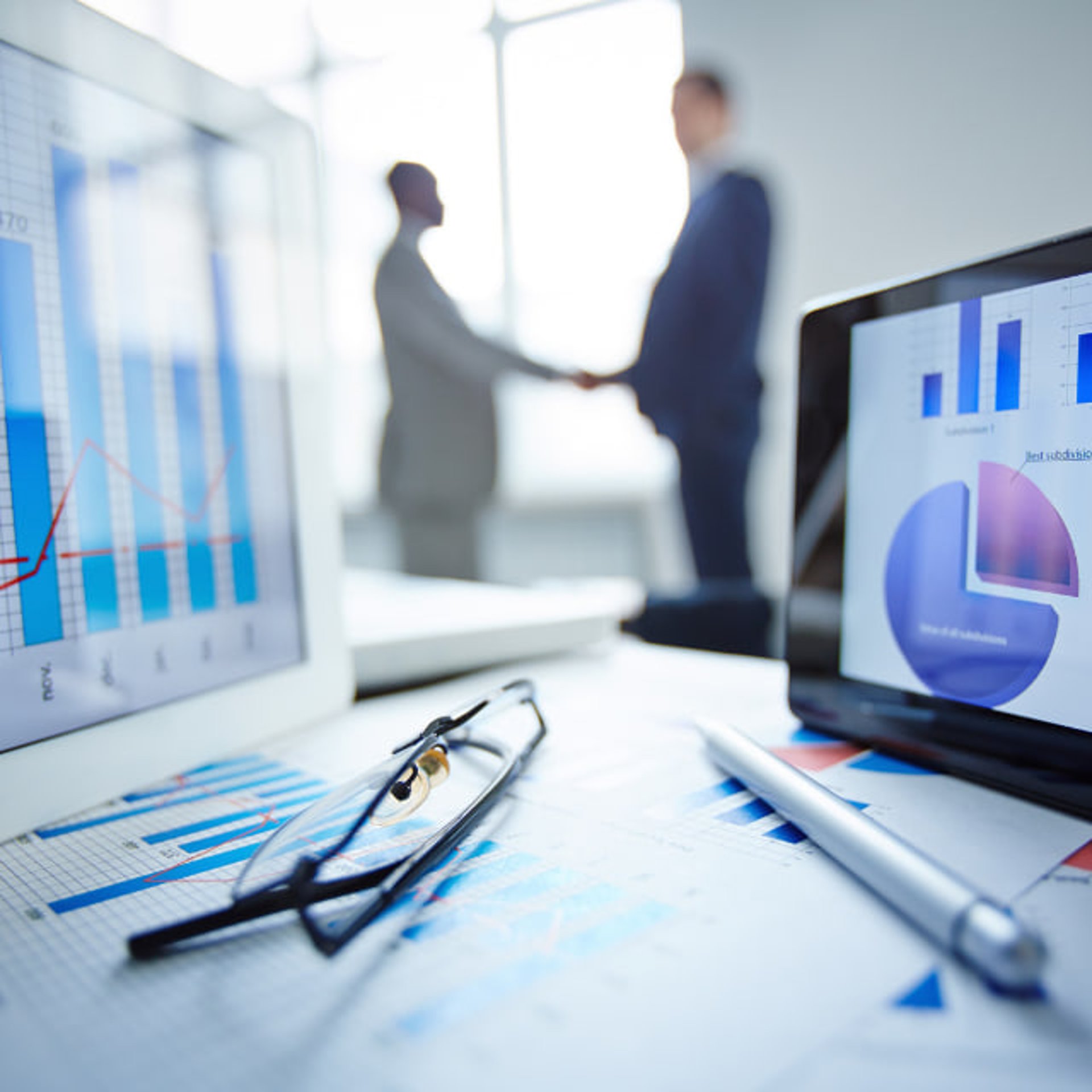 Apple MacBook beside computer mouse on table