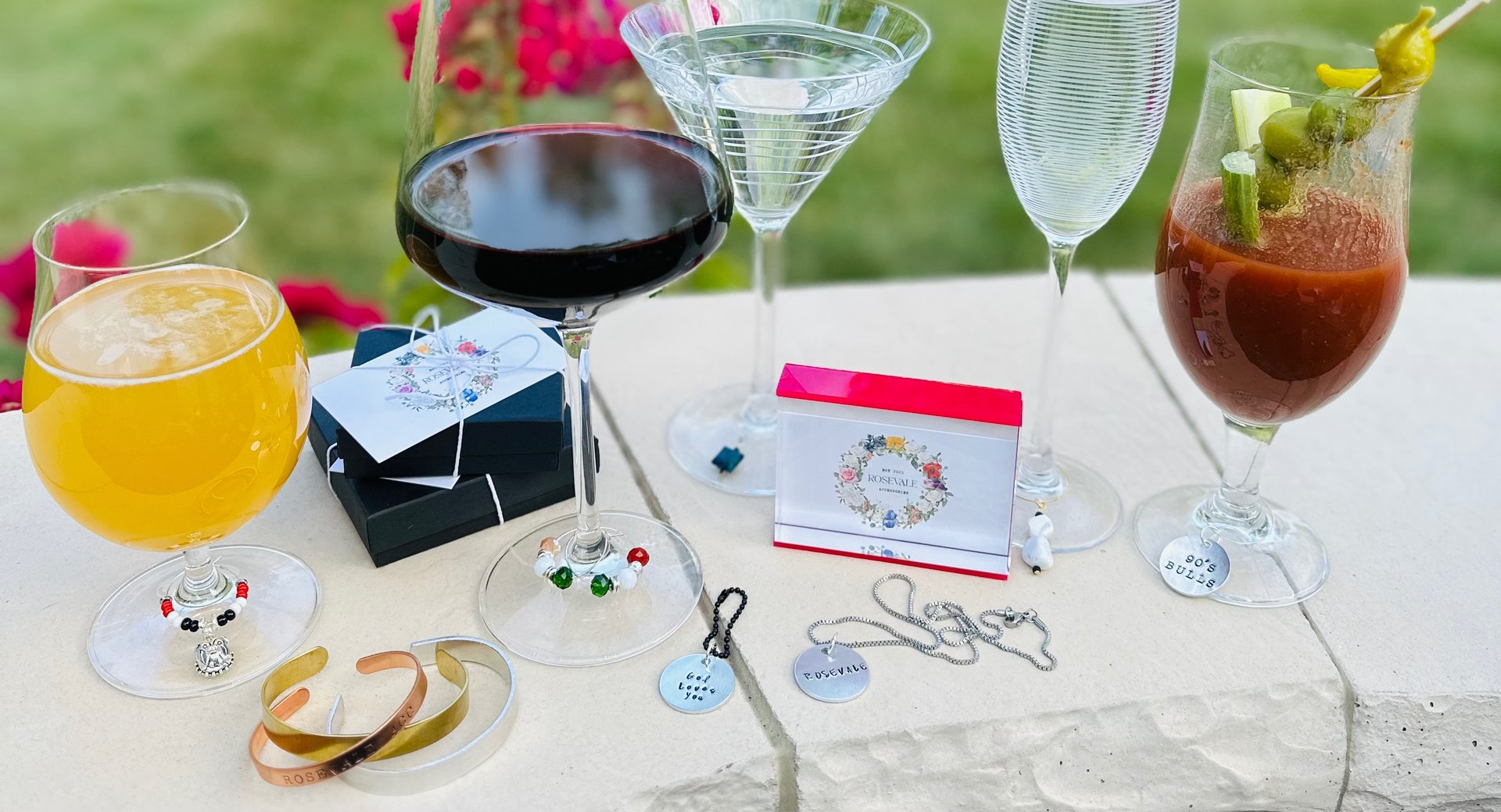 a wooden table topped with wine glasses and bottles