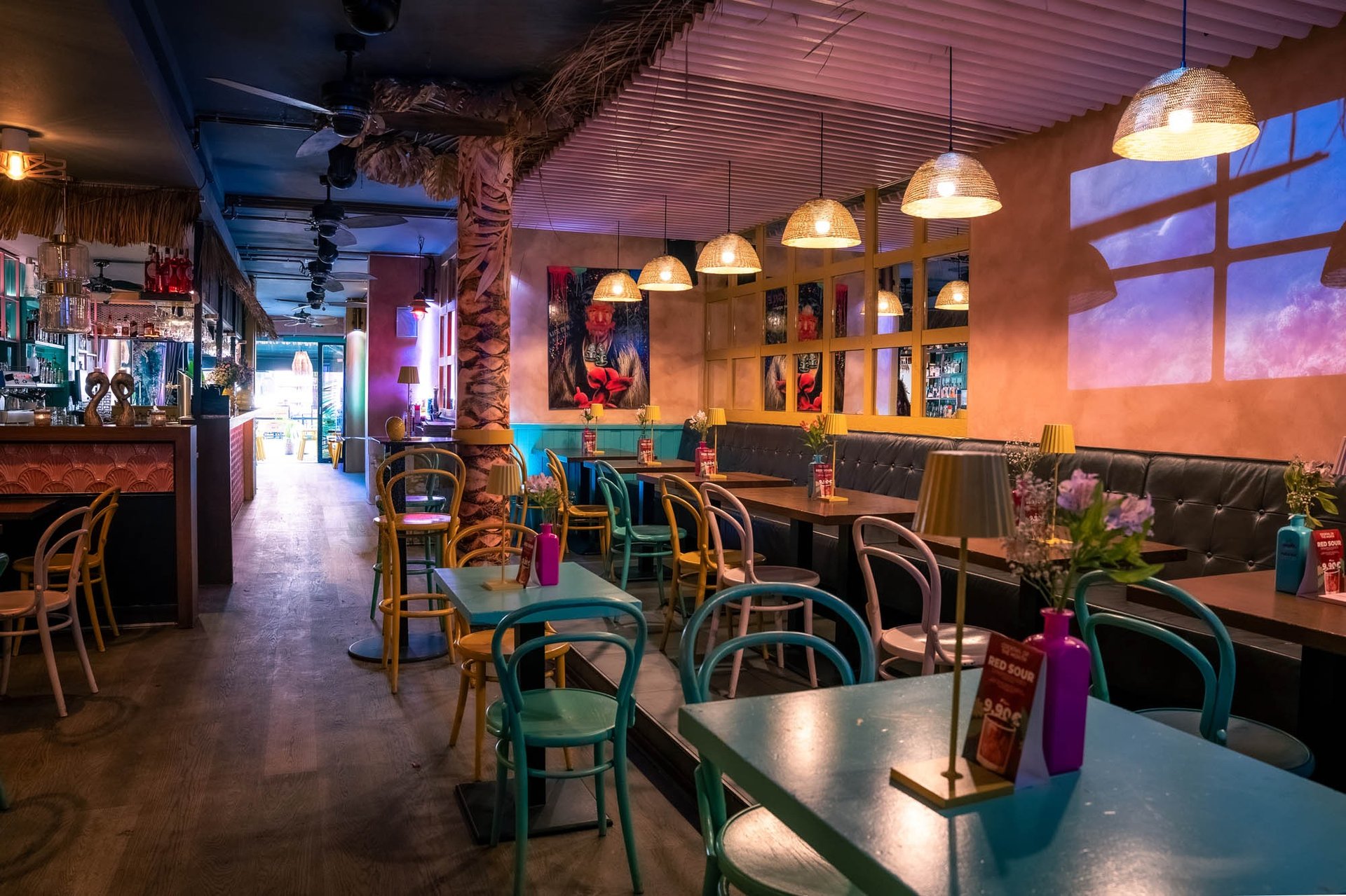 an abstract photo of a curved building with a blue sky in the background