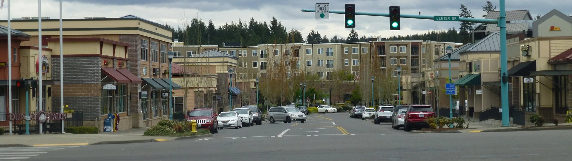 brown and white wooden table beside sofa chair