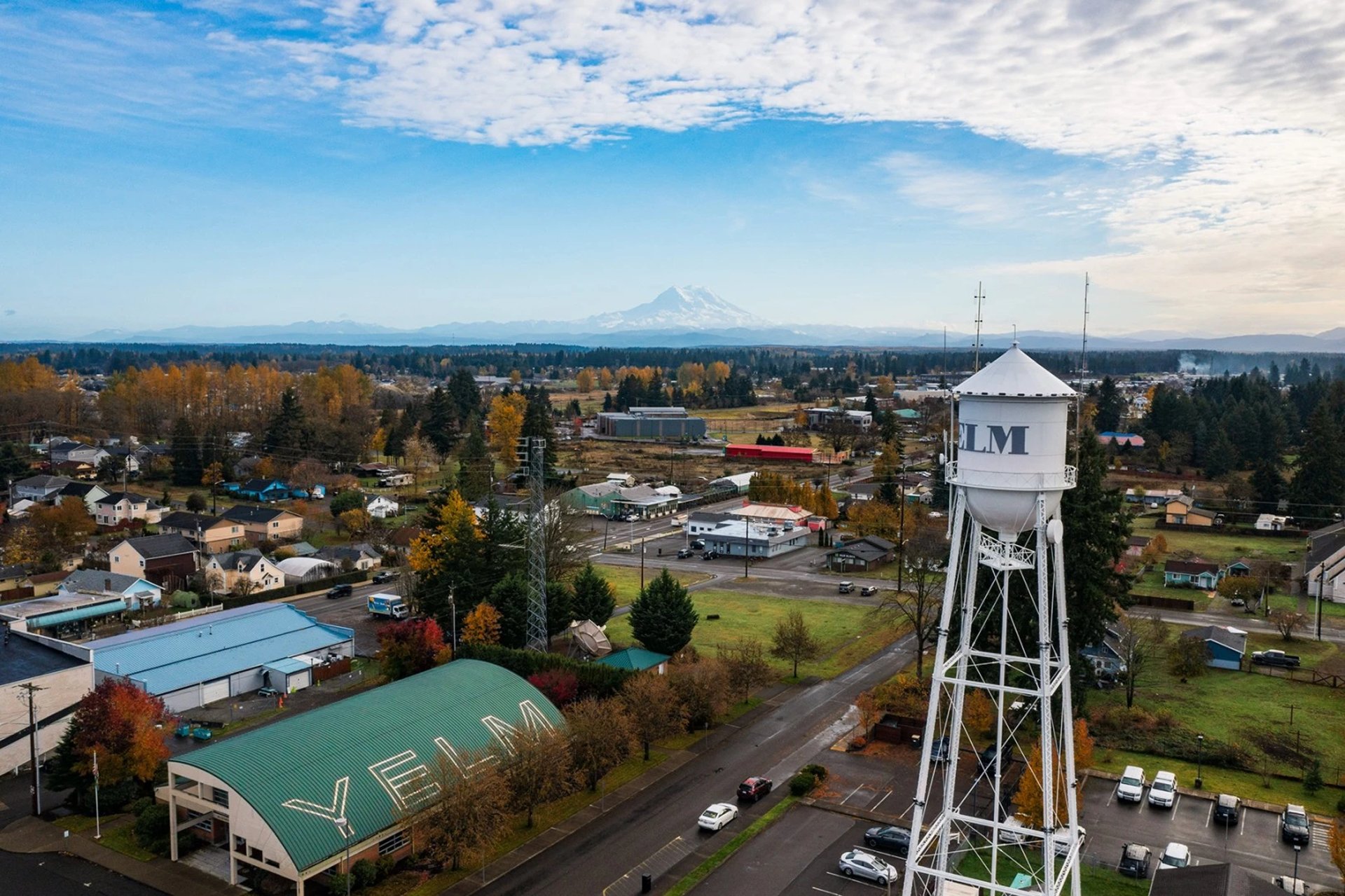 The dome of a building with trees in the background