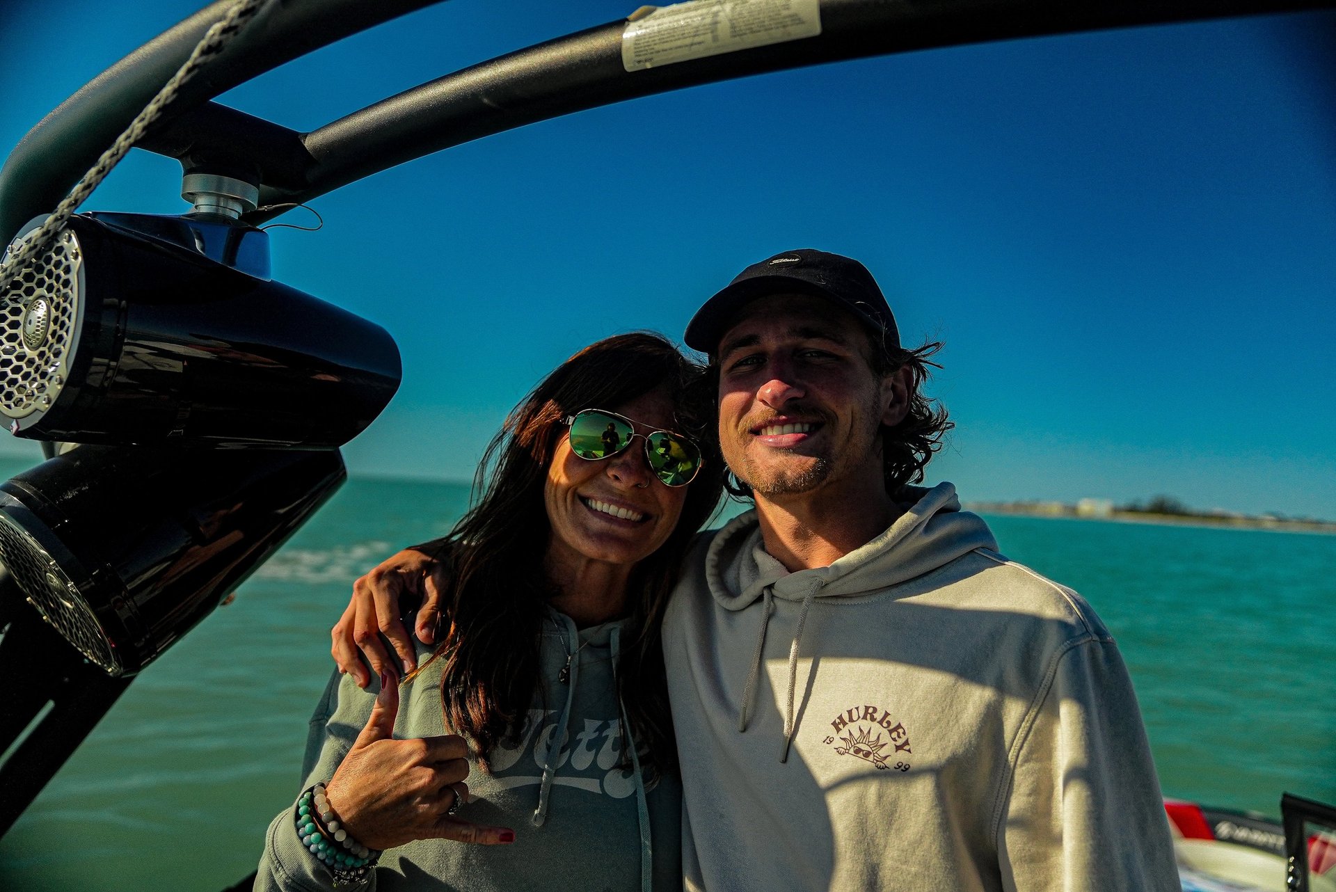 an abstract photo of a curved building with a blue sky in the background