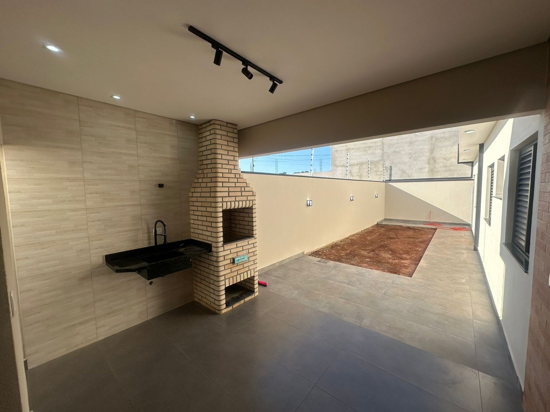 woman wearing yellow long-sleeved dress under white clouds and blue sky during daytime