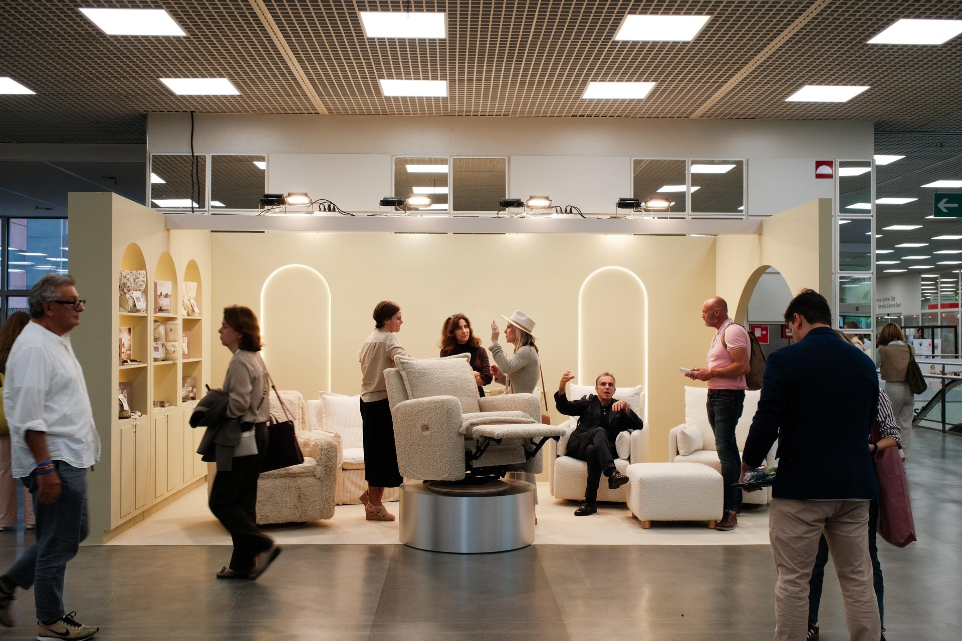 an abstract photo of a curved building with a blue sky in the background