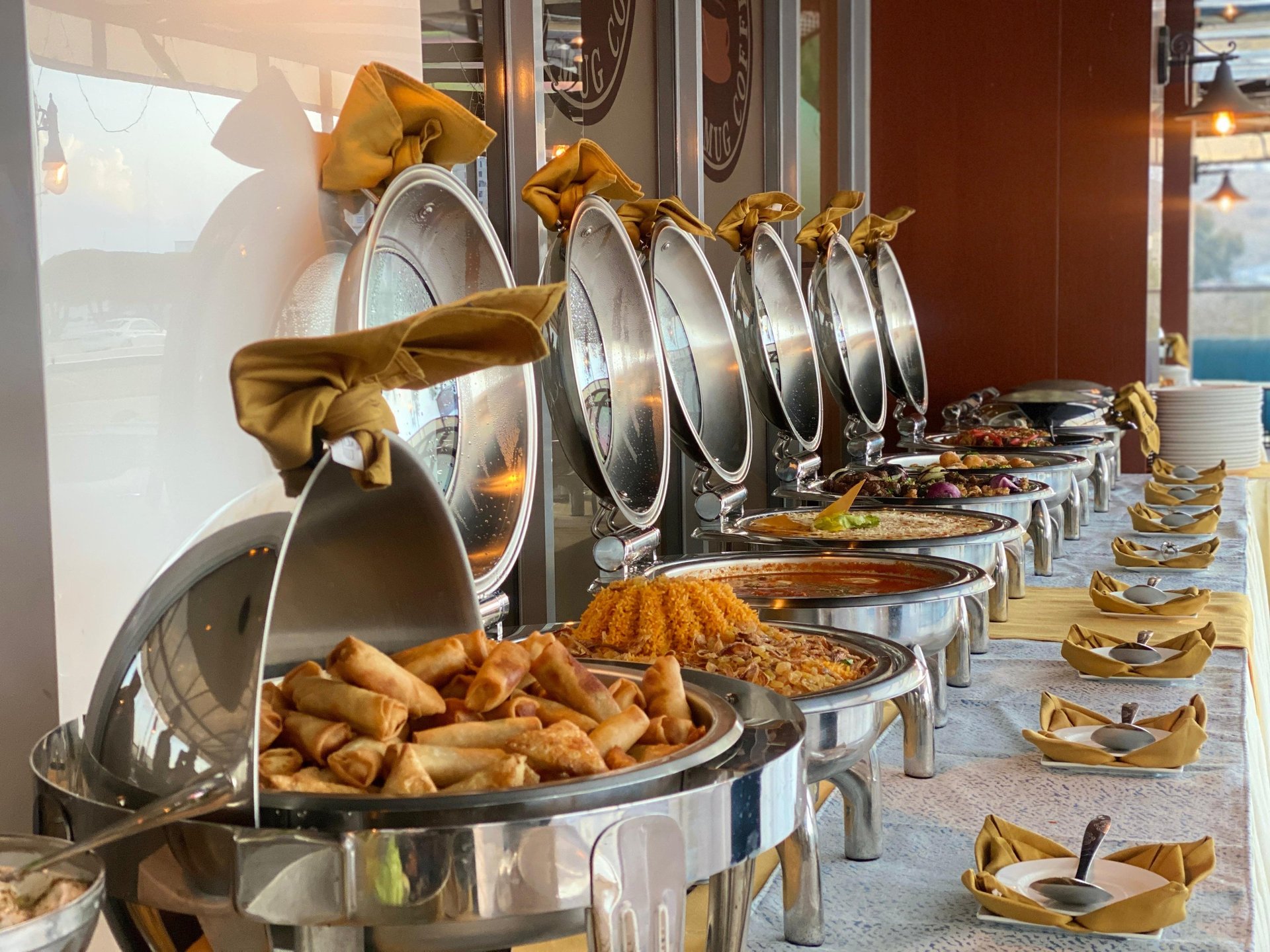 an abstract photo of a curved building with a blue sky in the background
