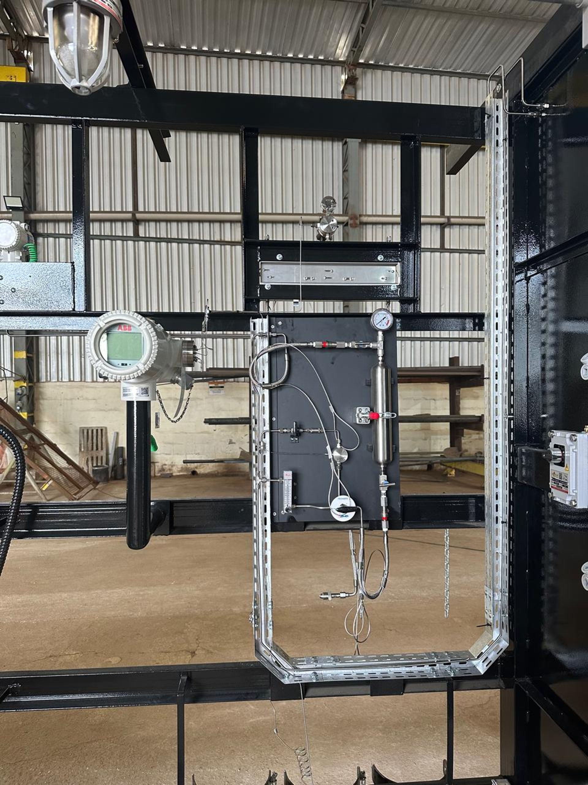 an abstract photo of a curved building with a blue sky in the background
