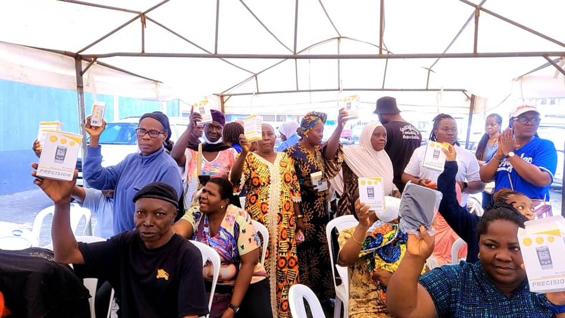 person washing hands in open faucet