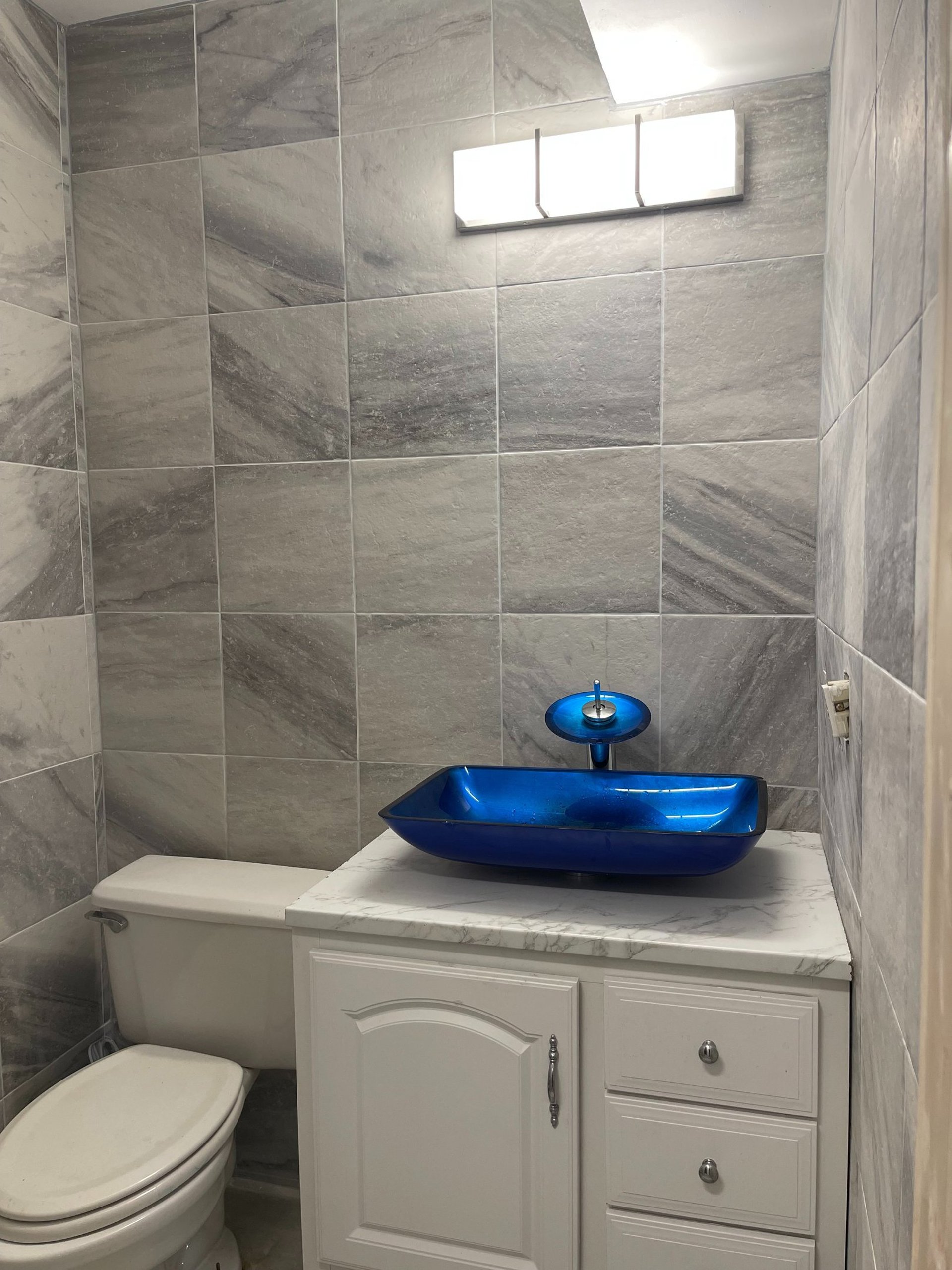 woman wearing yellow long-sleeved dress under white clouds and blue sky during daytime