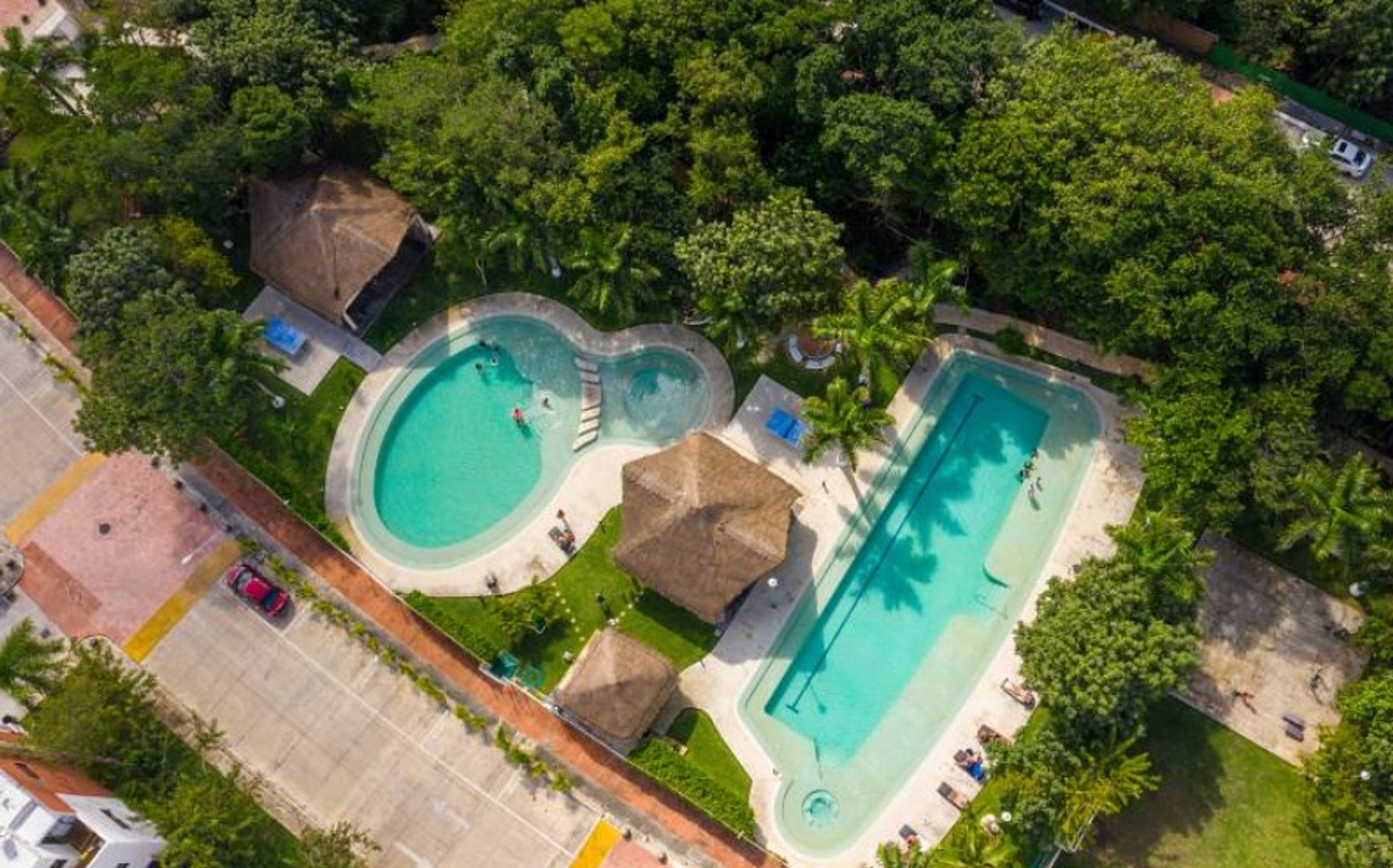 an abstract photo of a curved building with a blue sky in the background