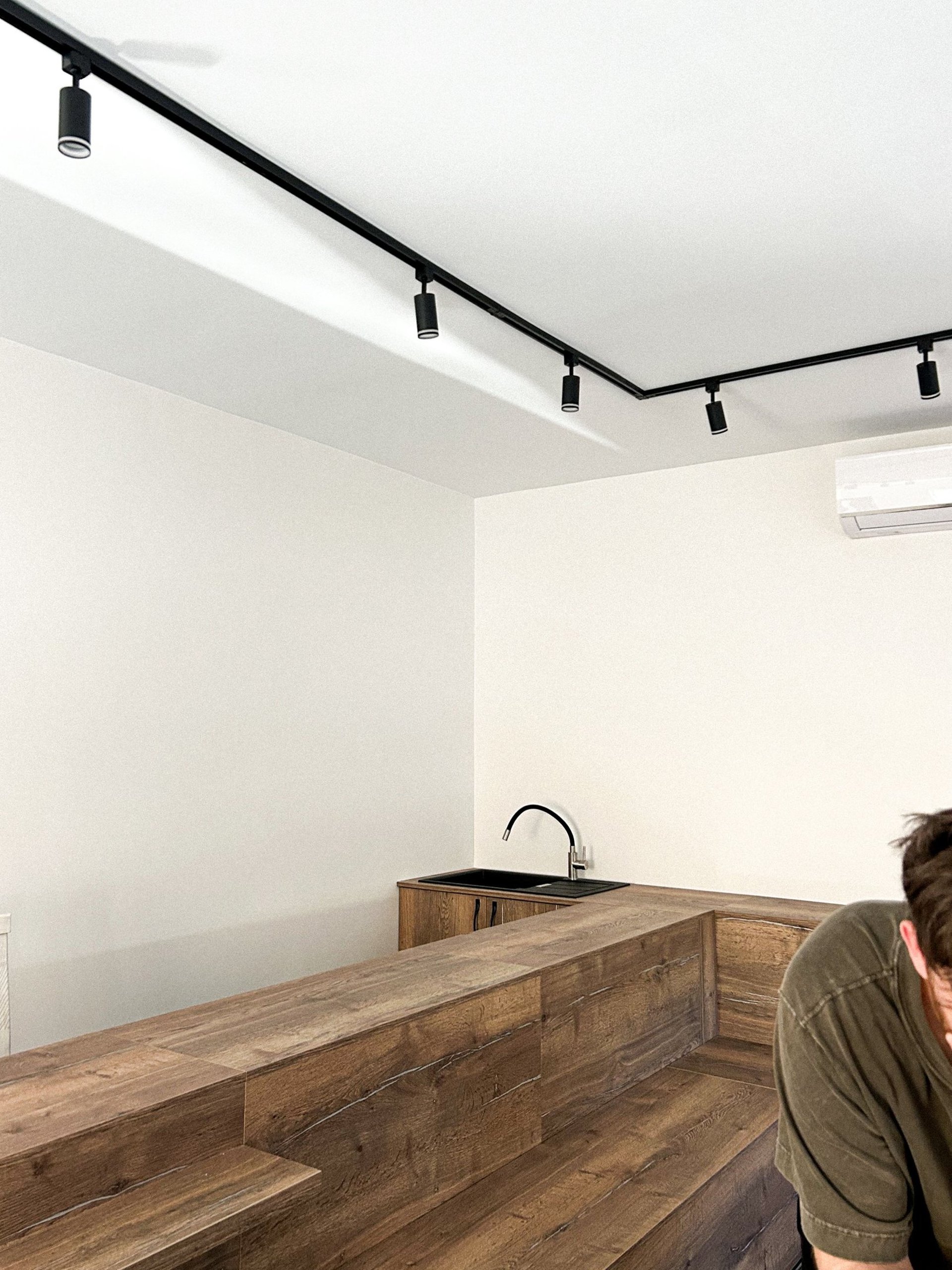 a close up of a black and brown abstract painting