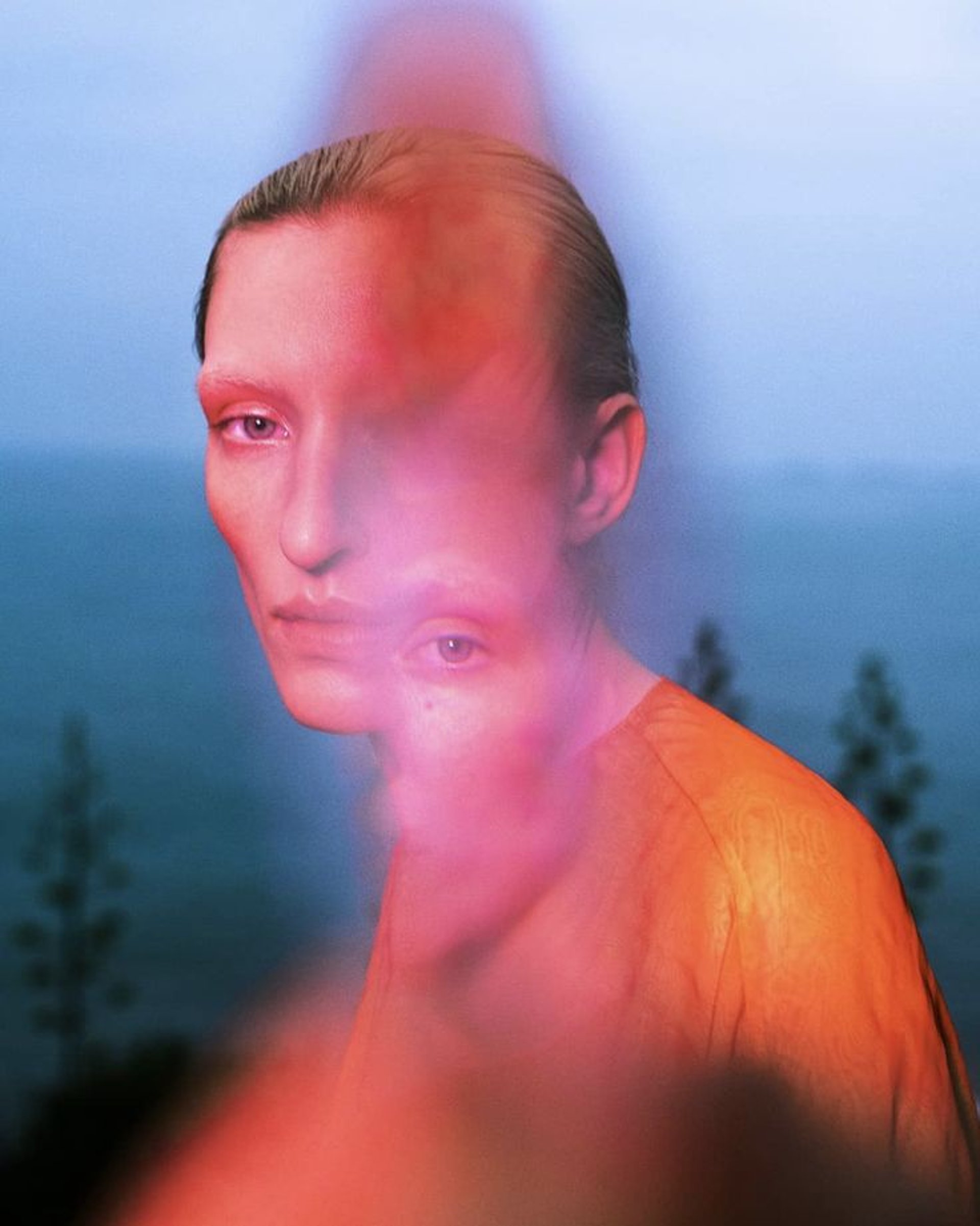 woman in white and brown dress standing on green grass during night time