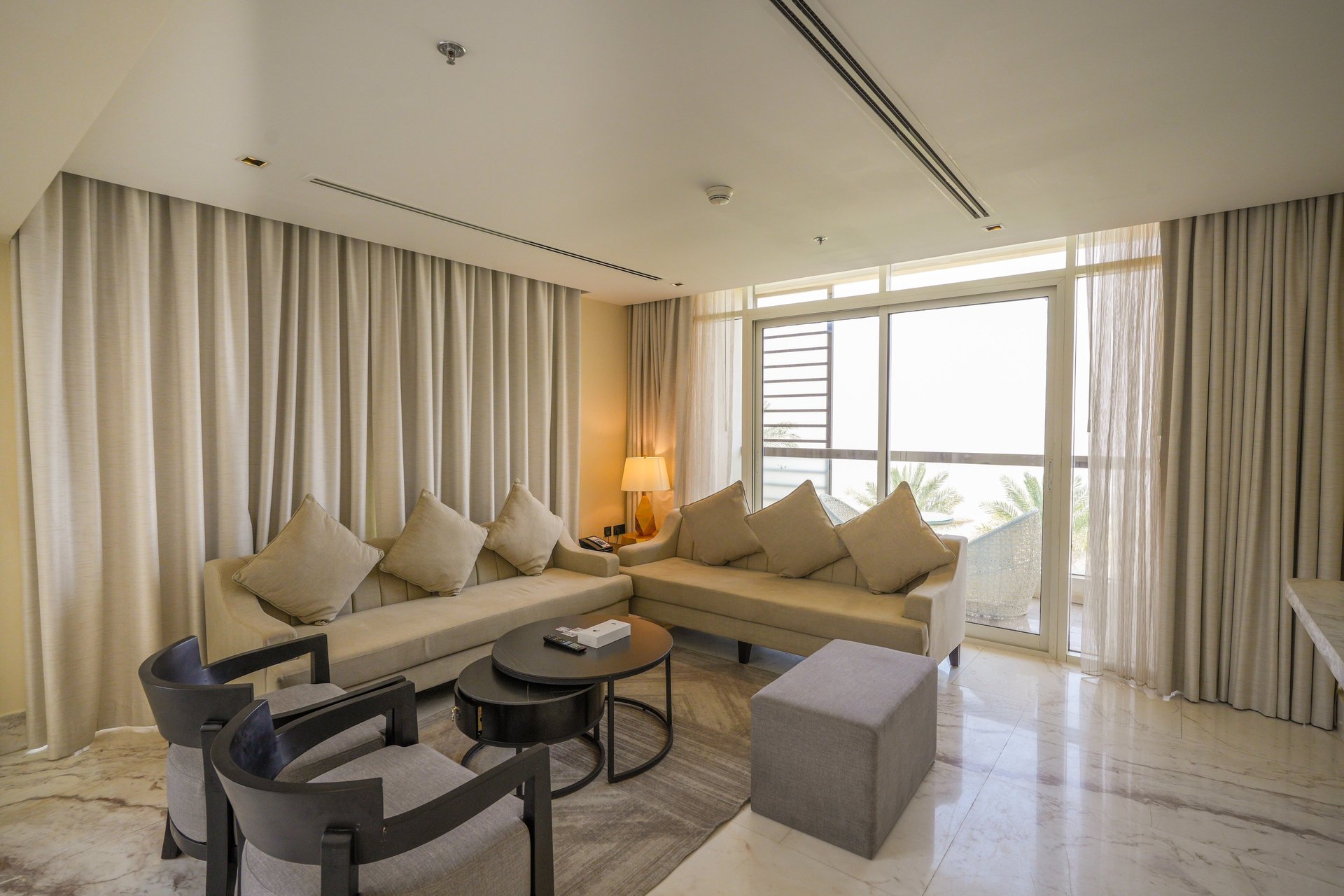 woman wearing yellow long-sleeved dress under white clouds and blue sky during daytime