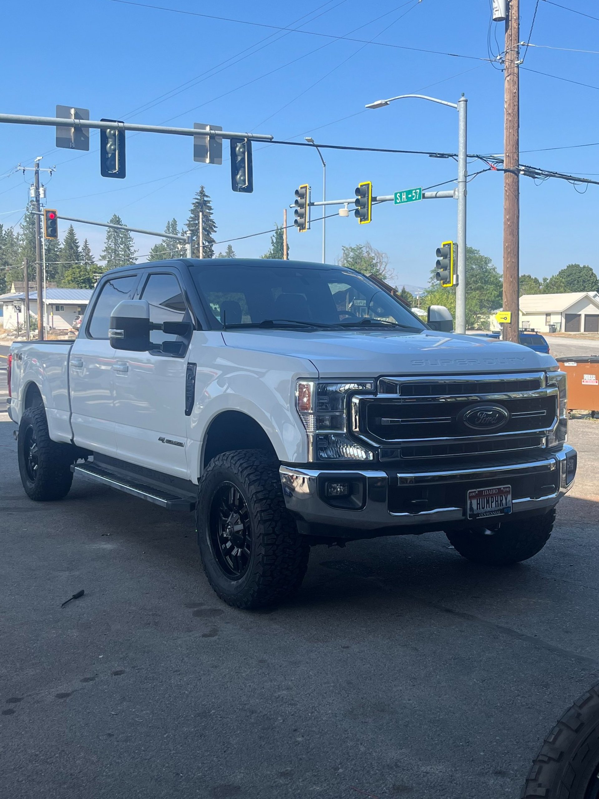 a ford power stroke with a lift kit and new tires from premier tire in sandpoint idaho