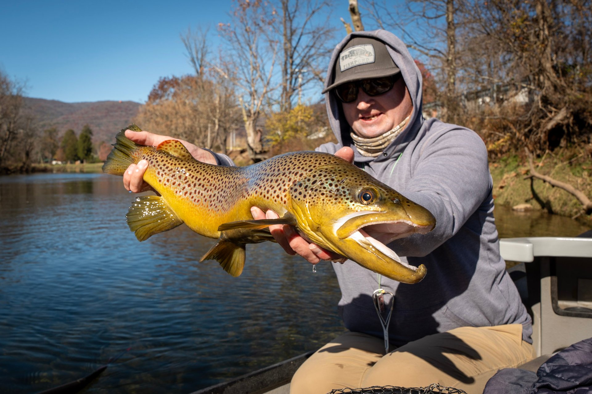 Guide Joe Kostura with a huge Watauga River brown trout.