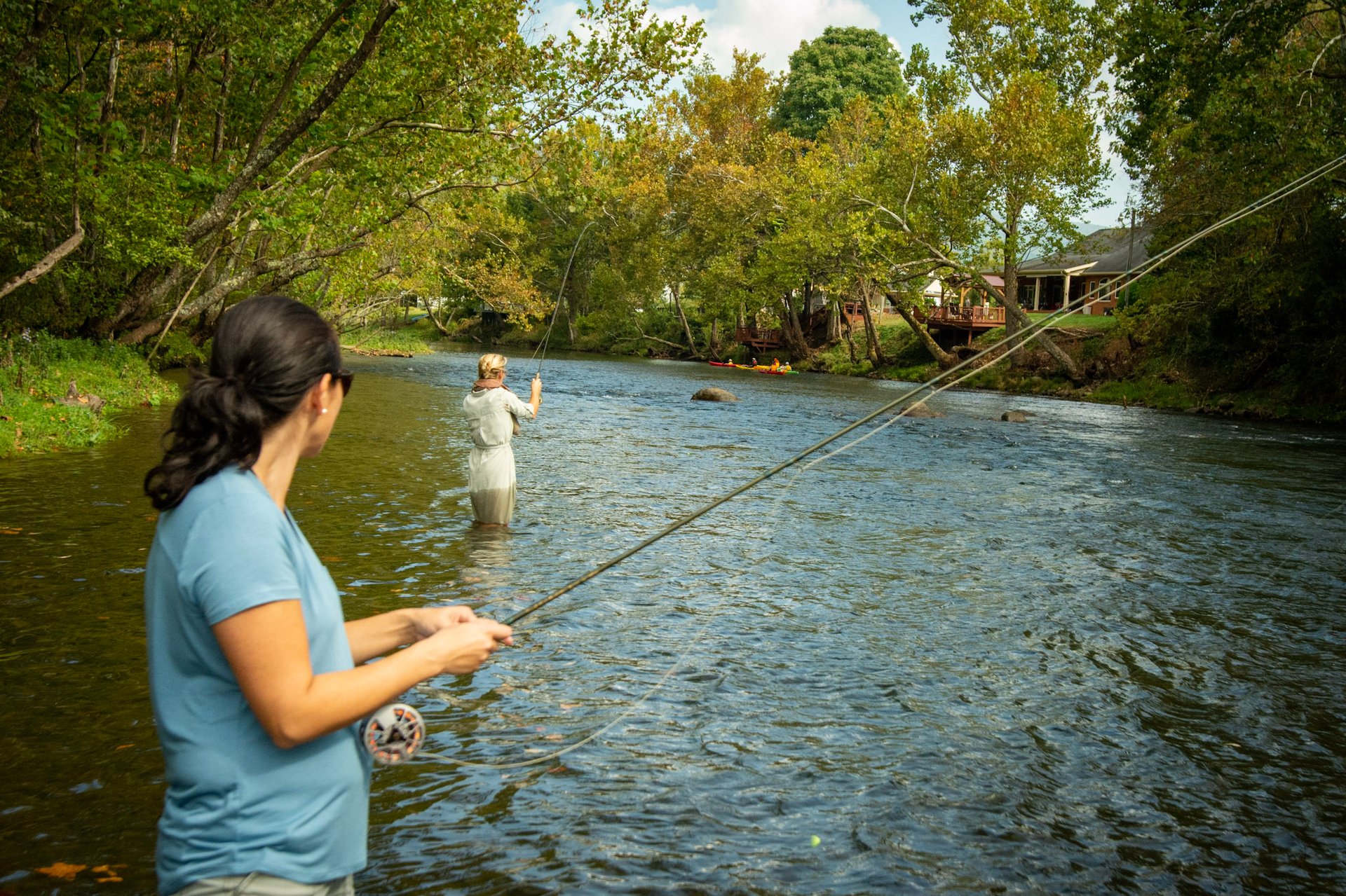 Women fly fishing the Watauga River in Tennessee