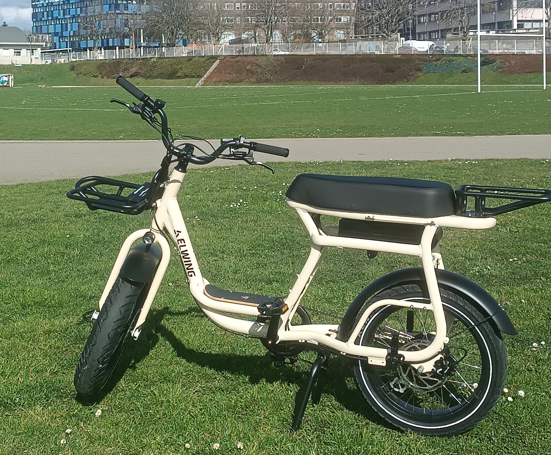 two persons riding on bicycles