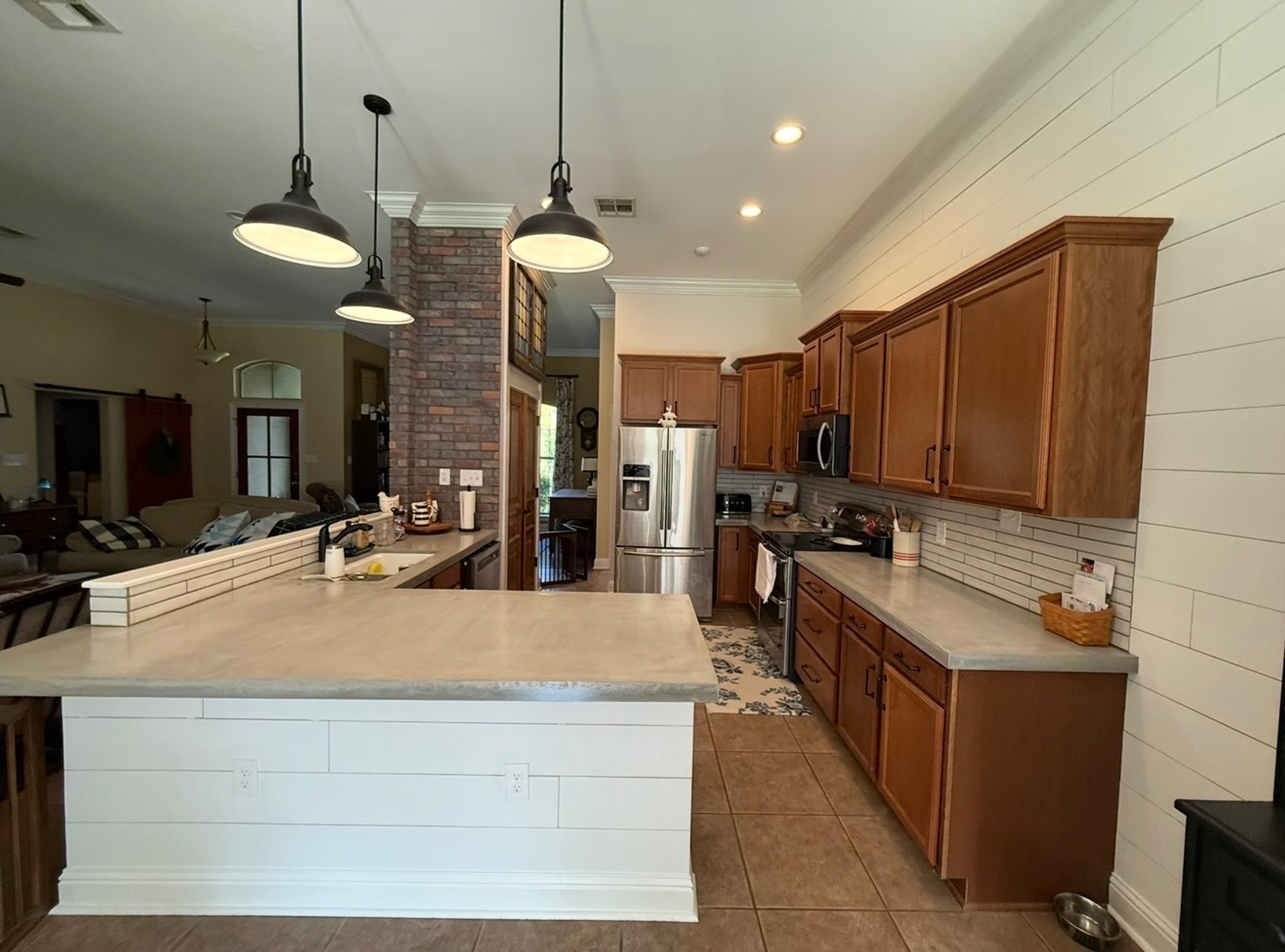black and brown leather padded tub sofa