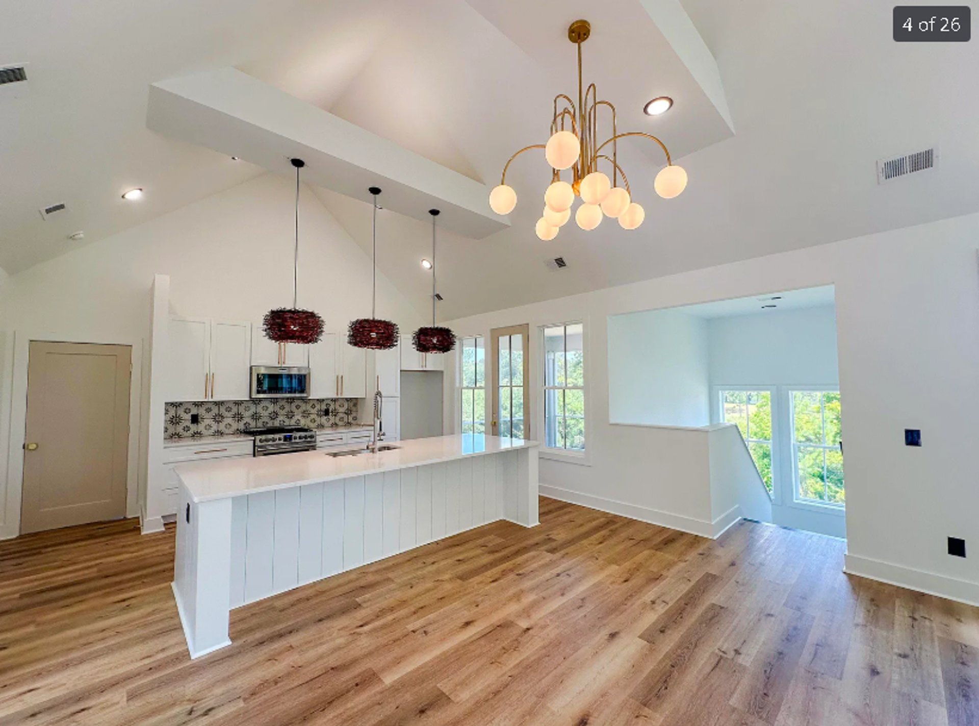 woman wearing yellow long-sleeved dress under white clouds and blue sky during daytime