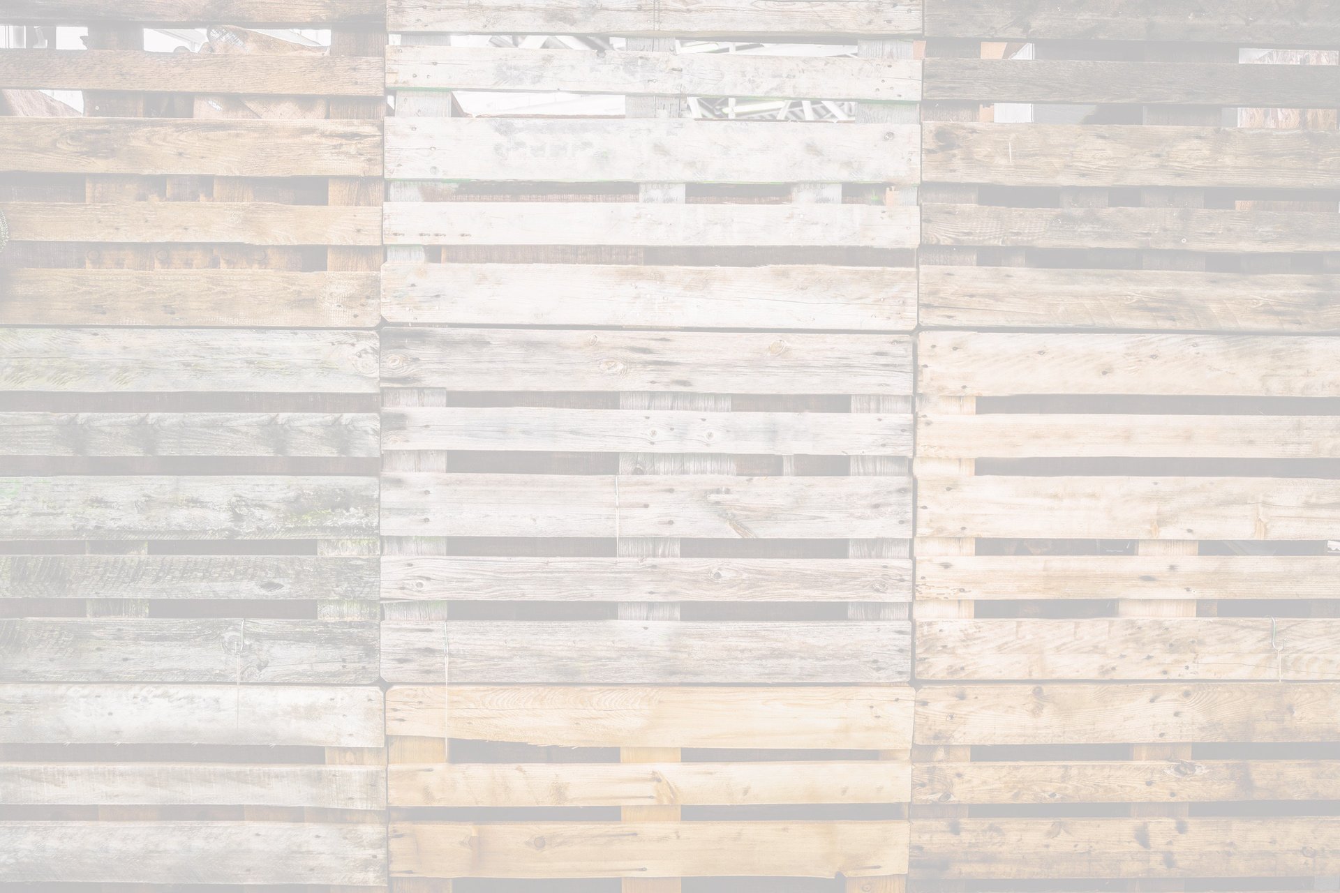 a white wall that has a bunch of strips of paper on it