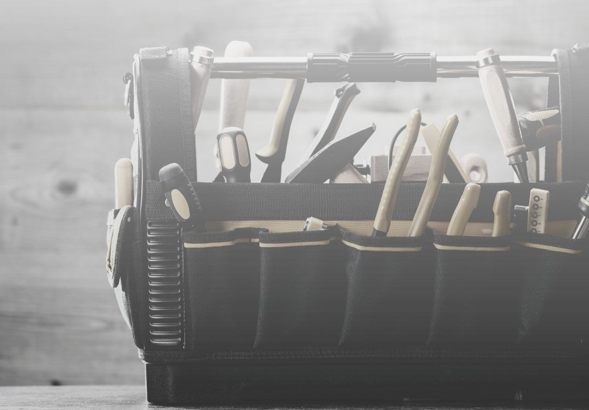 Photo of a toolkit for manufacturing leaders developing brand transition strategy during merger