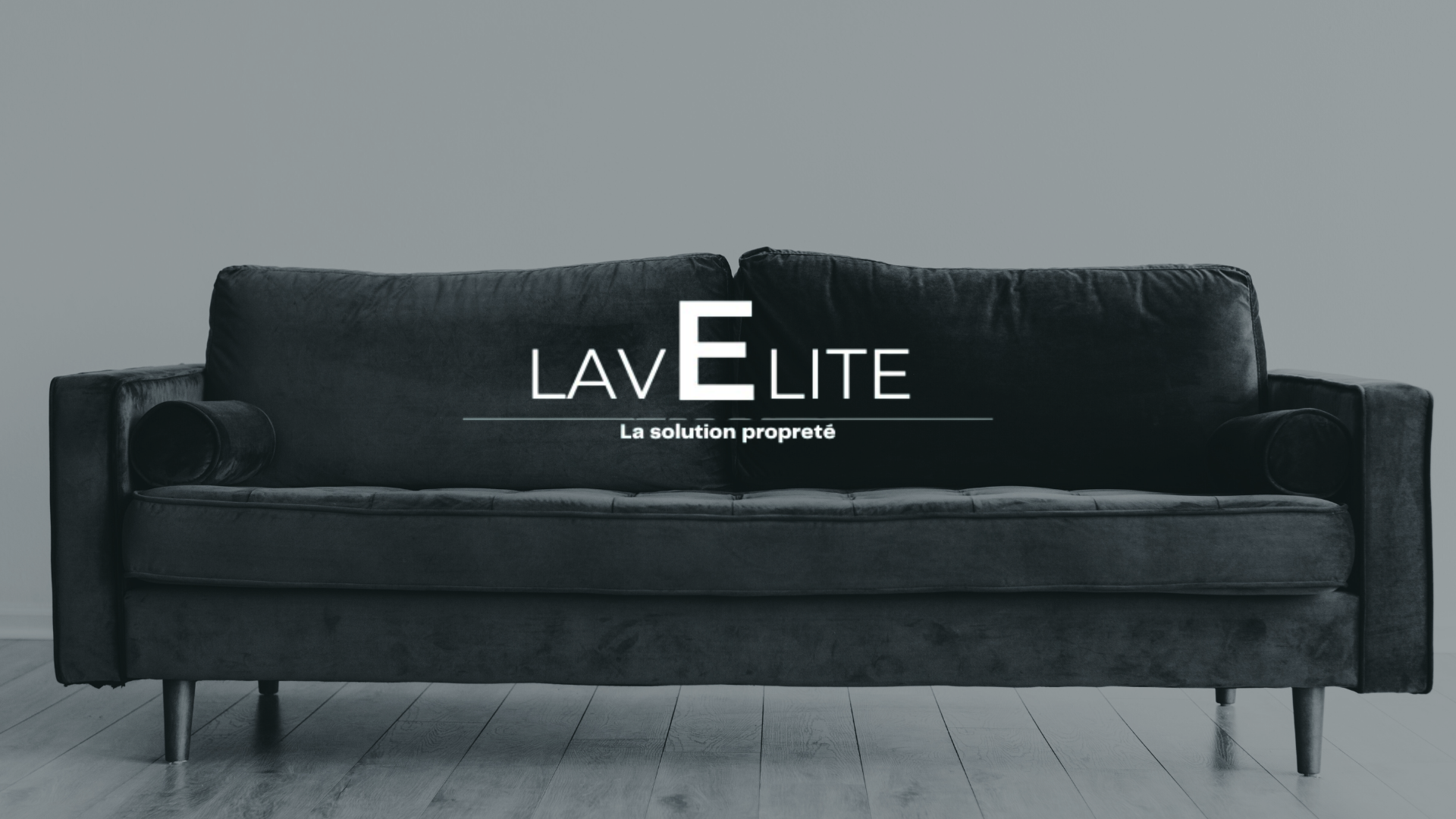 black and brown leather padded tub sofa