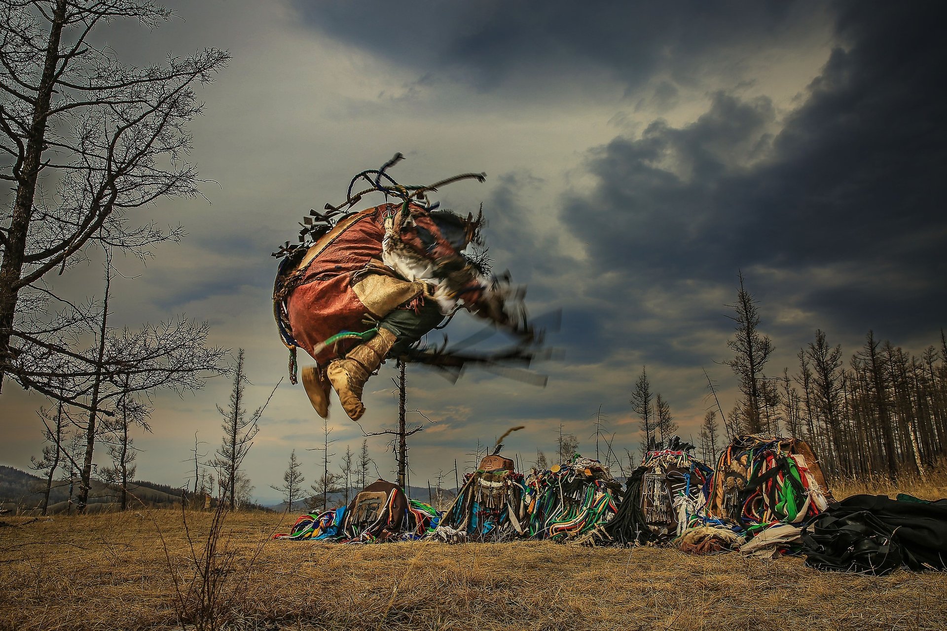 people sitting on grass field during daytime
