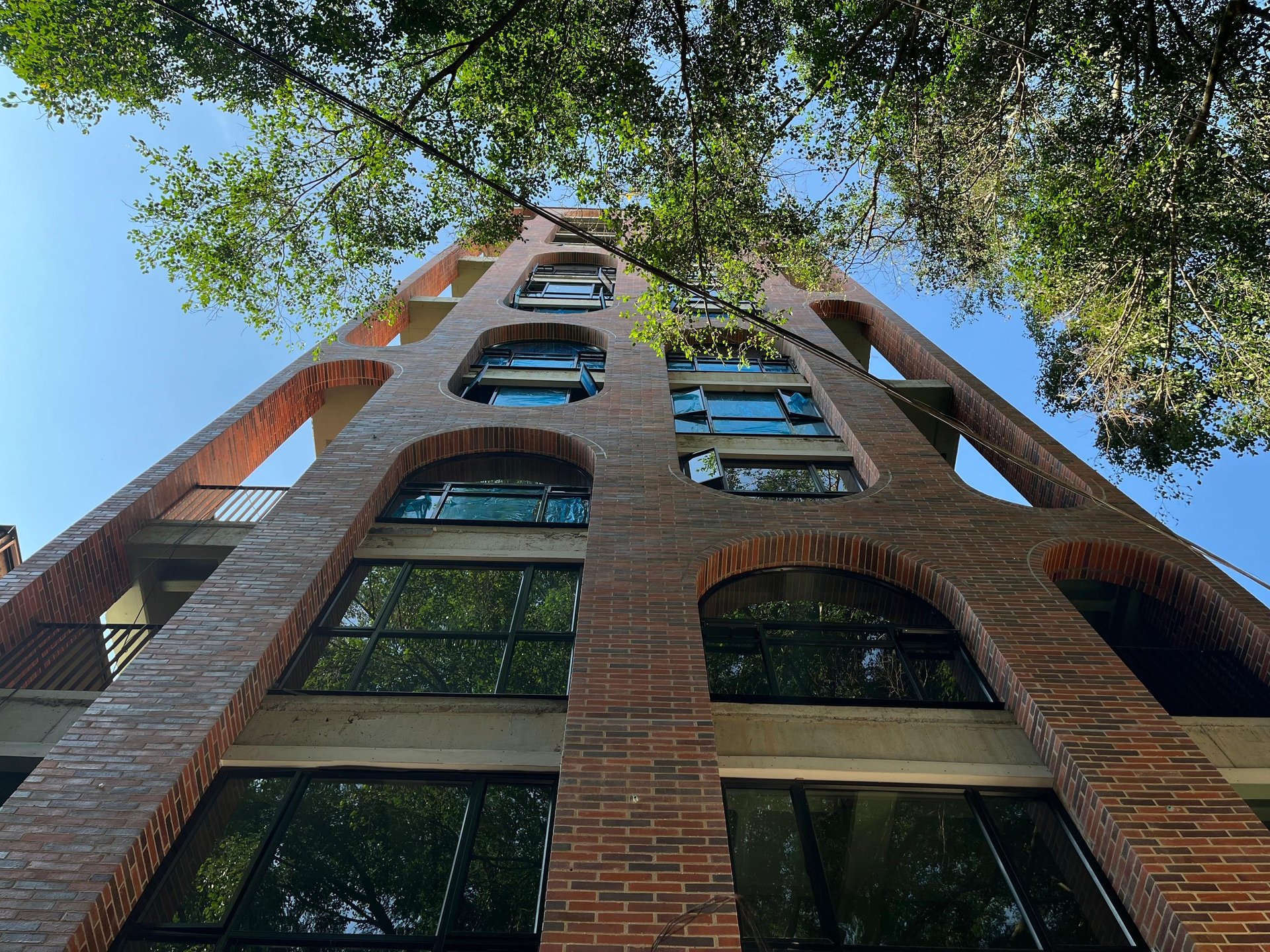 black and brown leather padded tub sofa