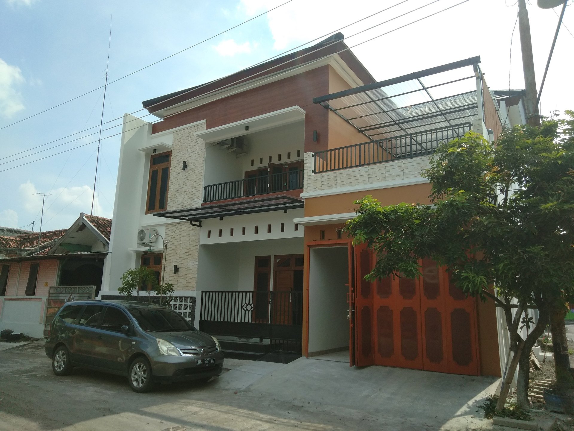 black and brown leather padded tub sofa