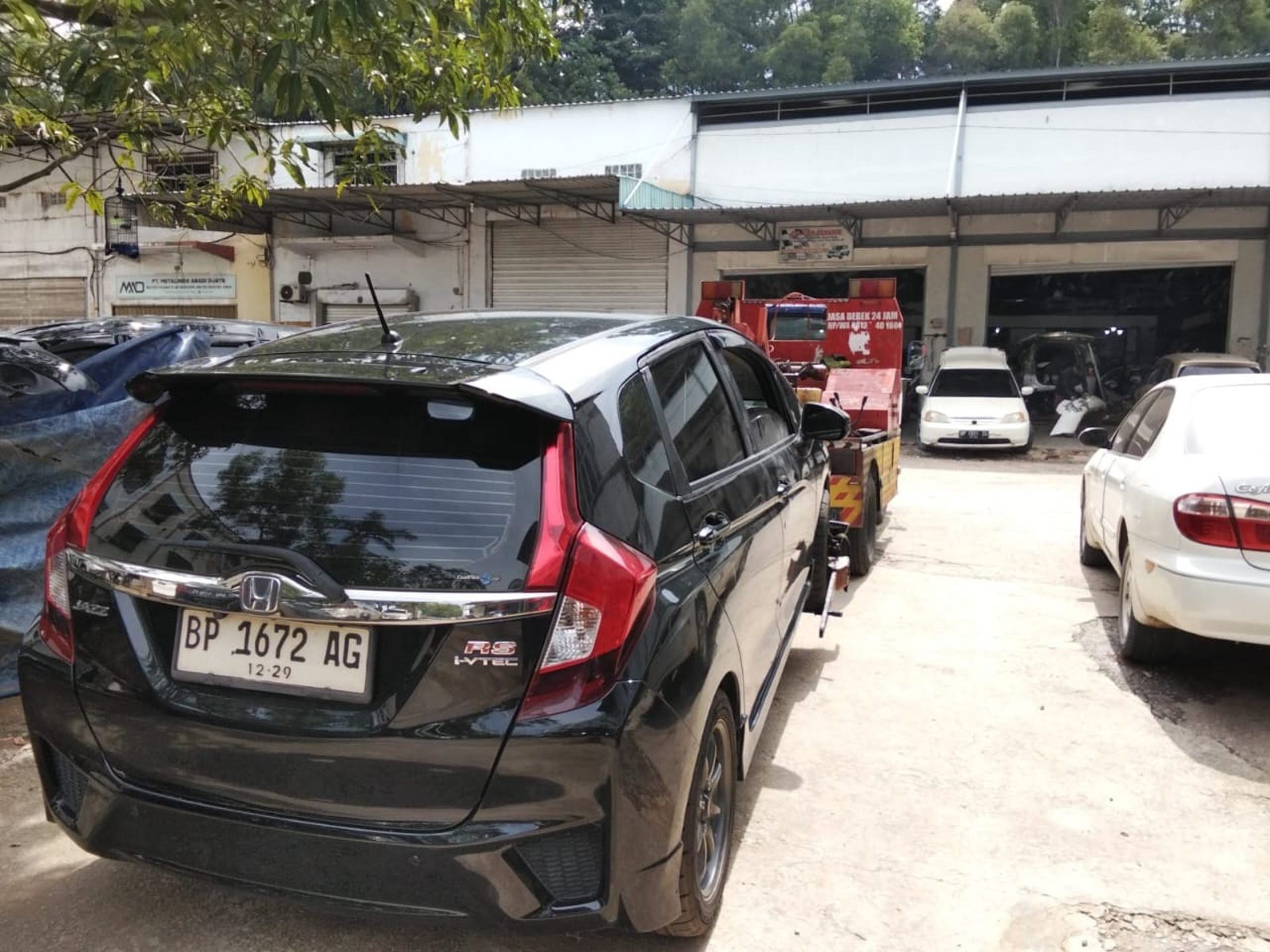black and brown leather padded tub sofa