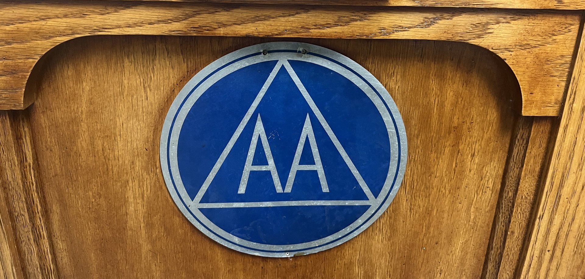 black and brown leather padded tub sofa